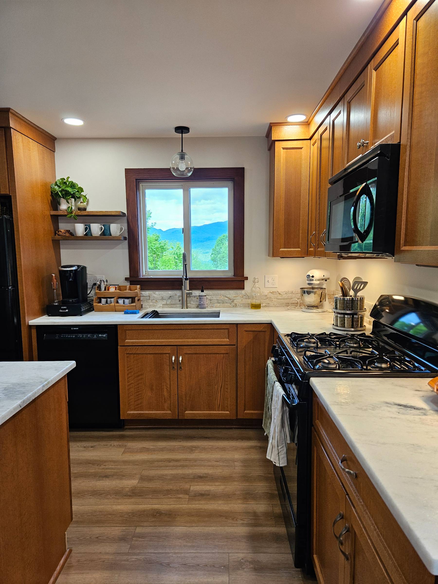 Start your morning at the sink with the mountains right there — coffee, quiet, and nowhere you have to be.