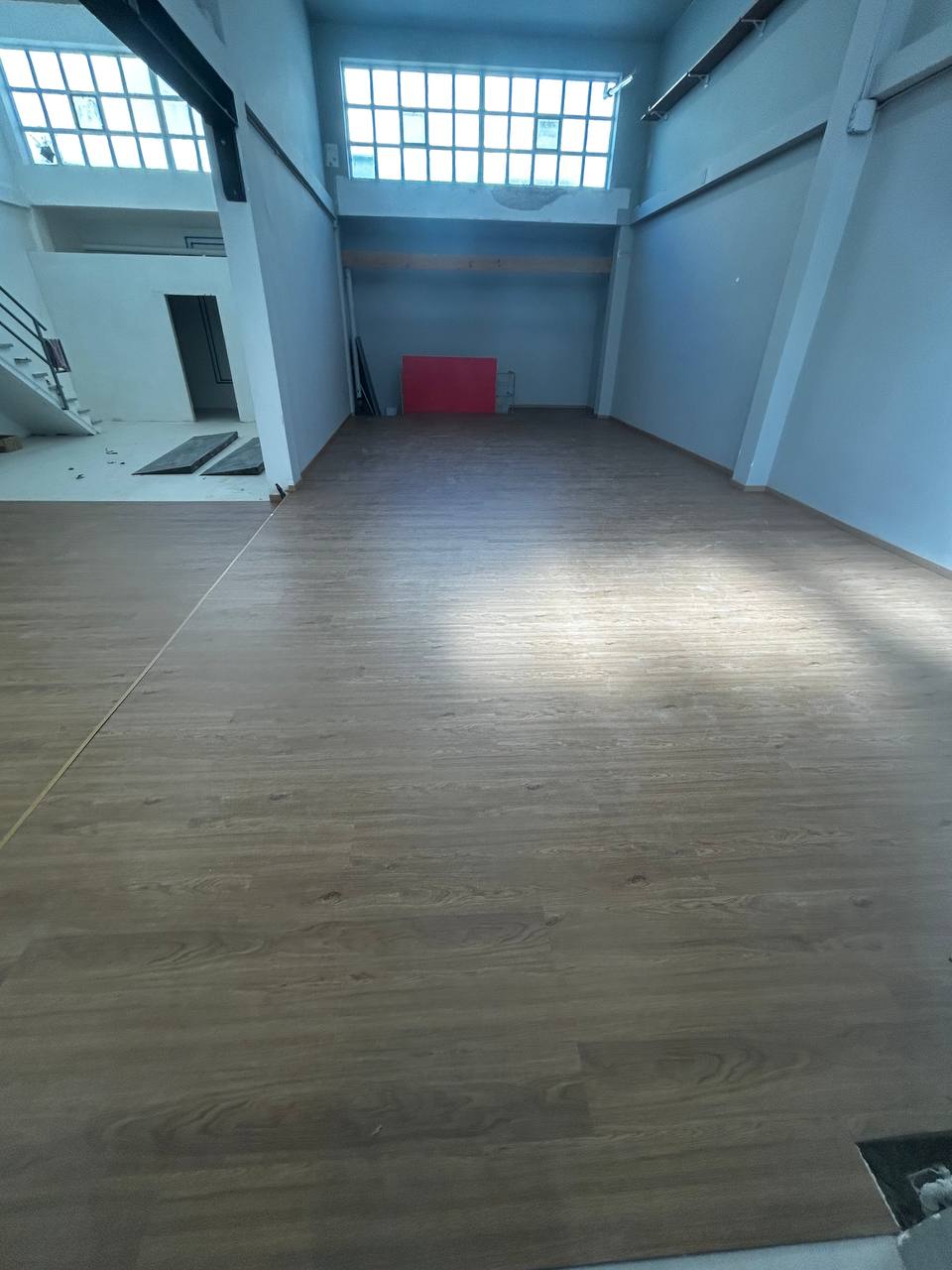 Palestra con SPC effetto legno posato