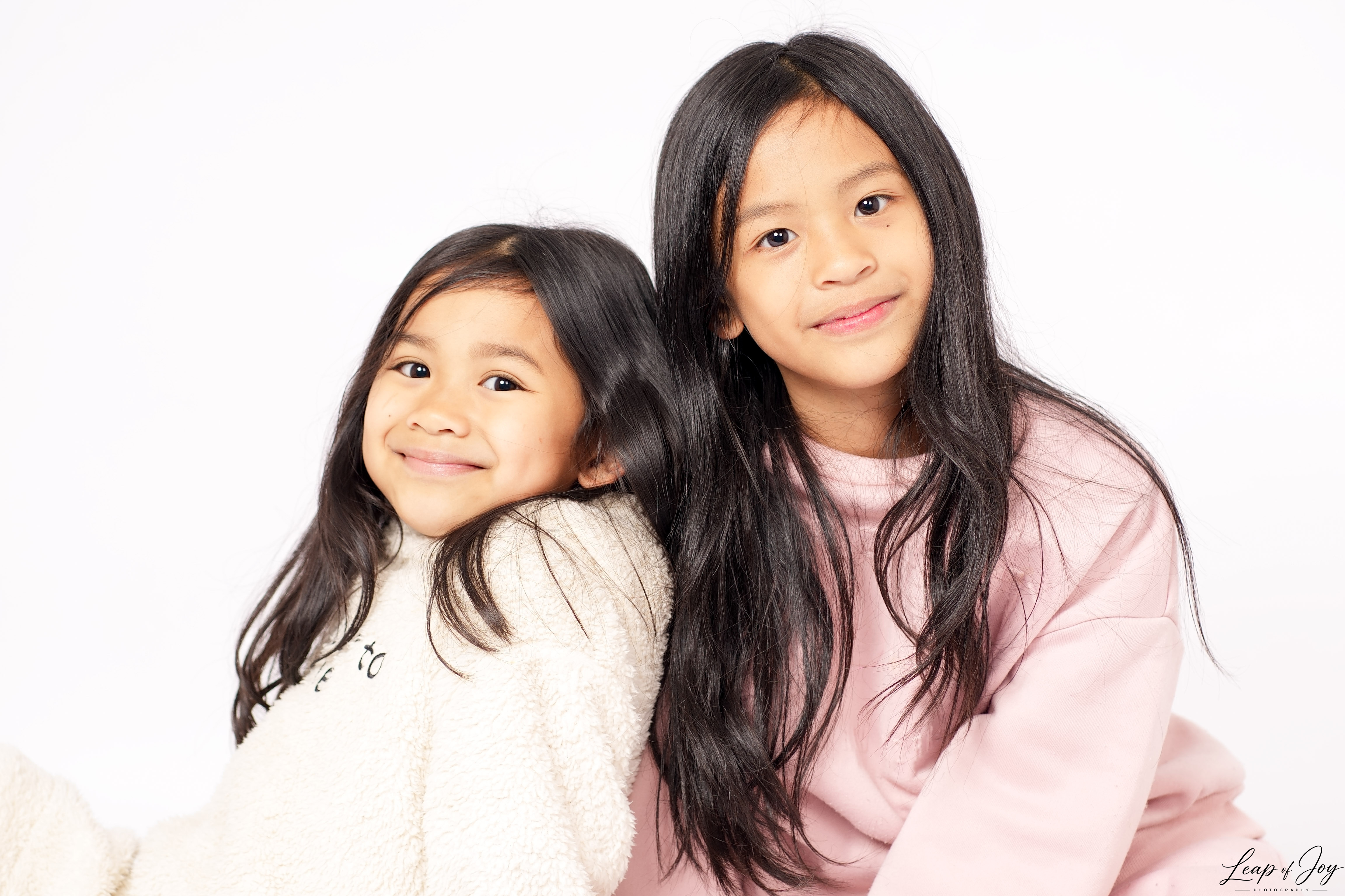 A family photographed in the Auckland studio
