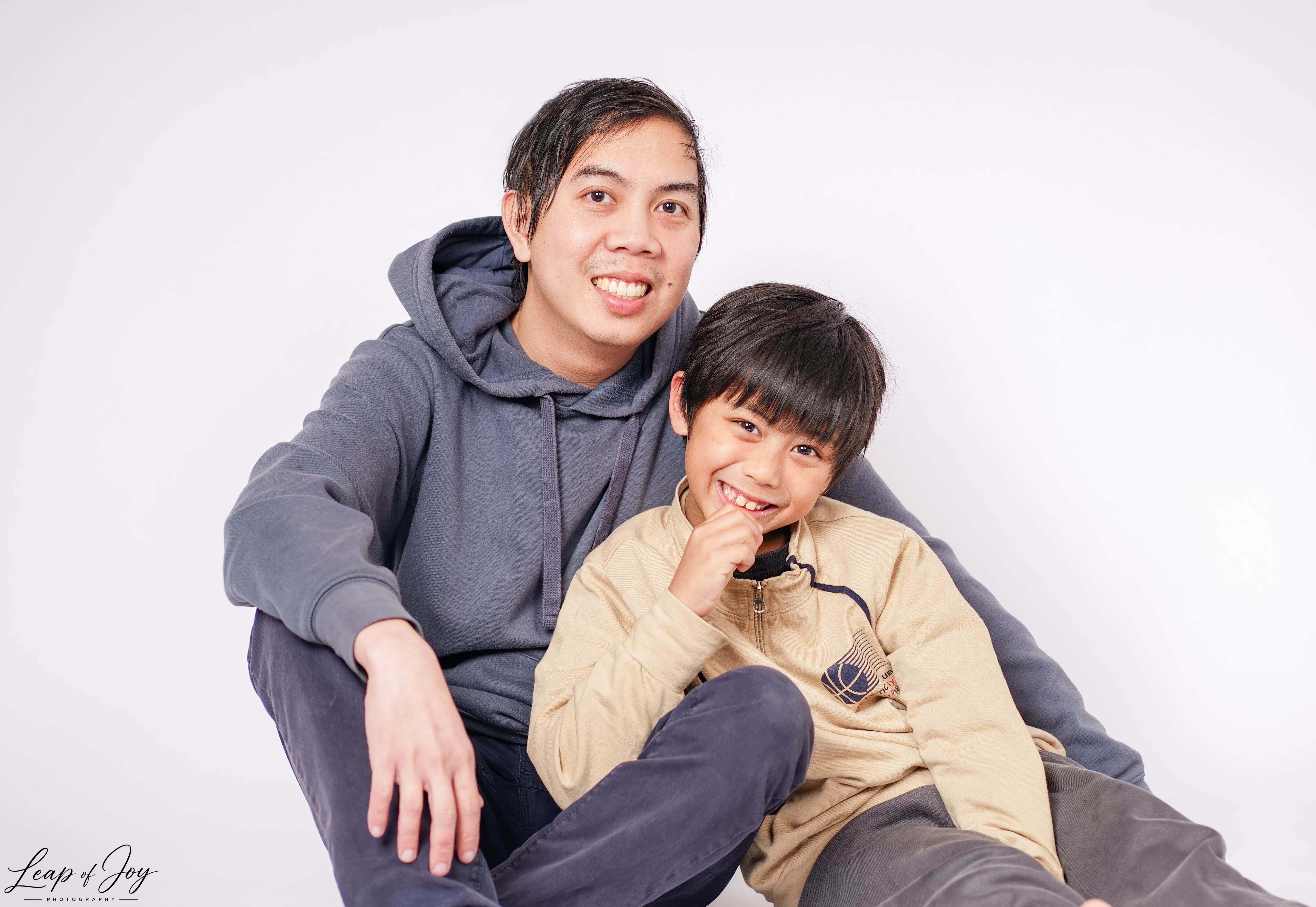 A family photographed in the Auckland studio