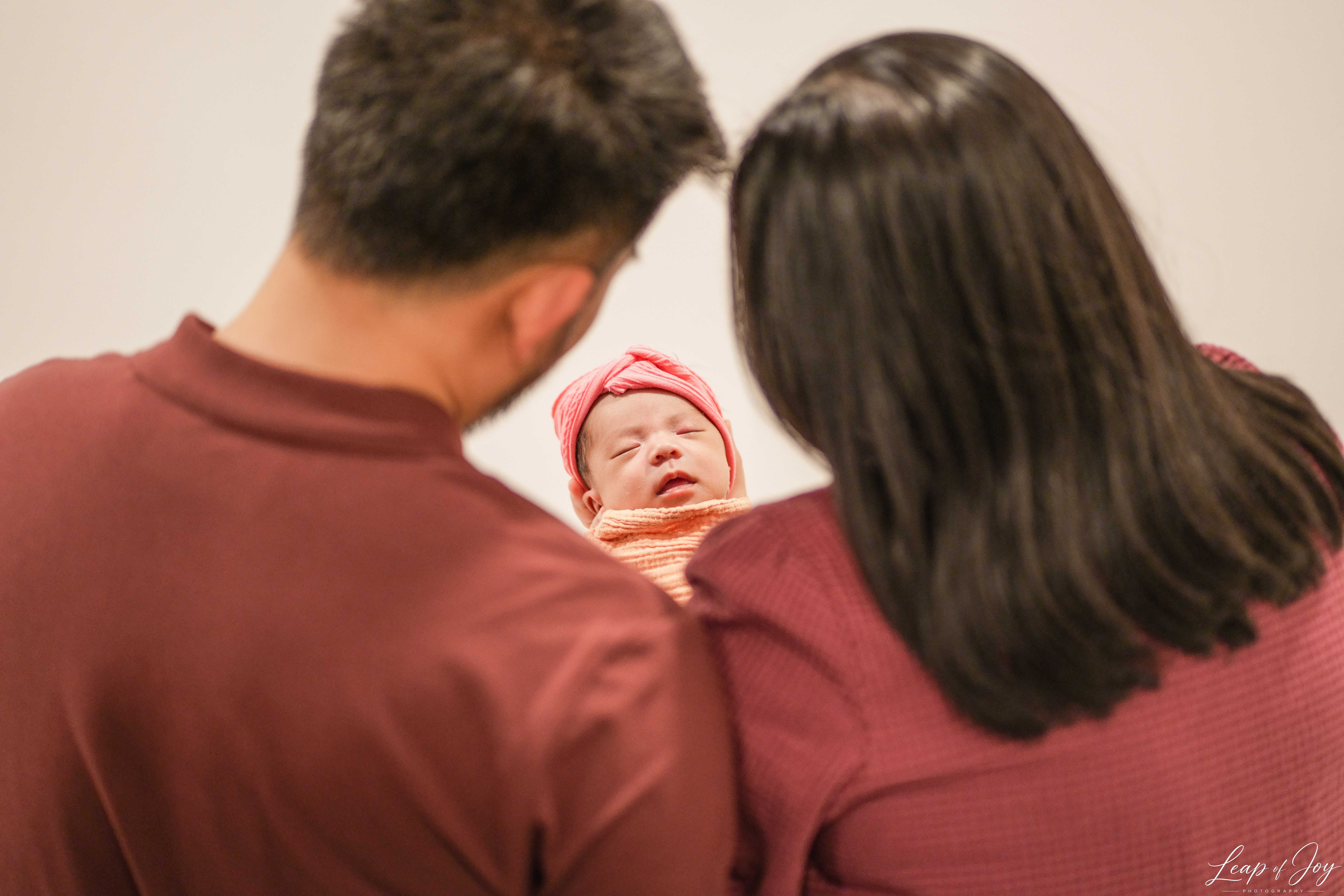 A family photographed in the Auckland studio