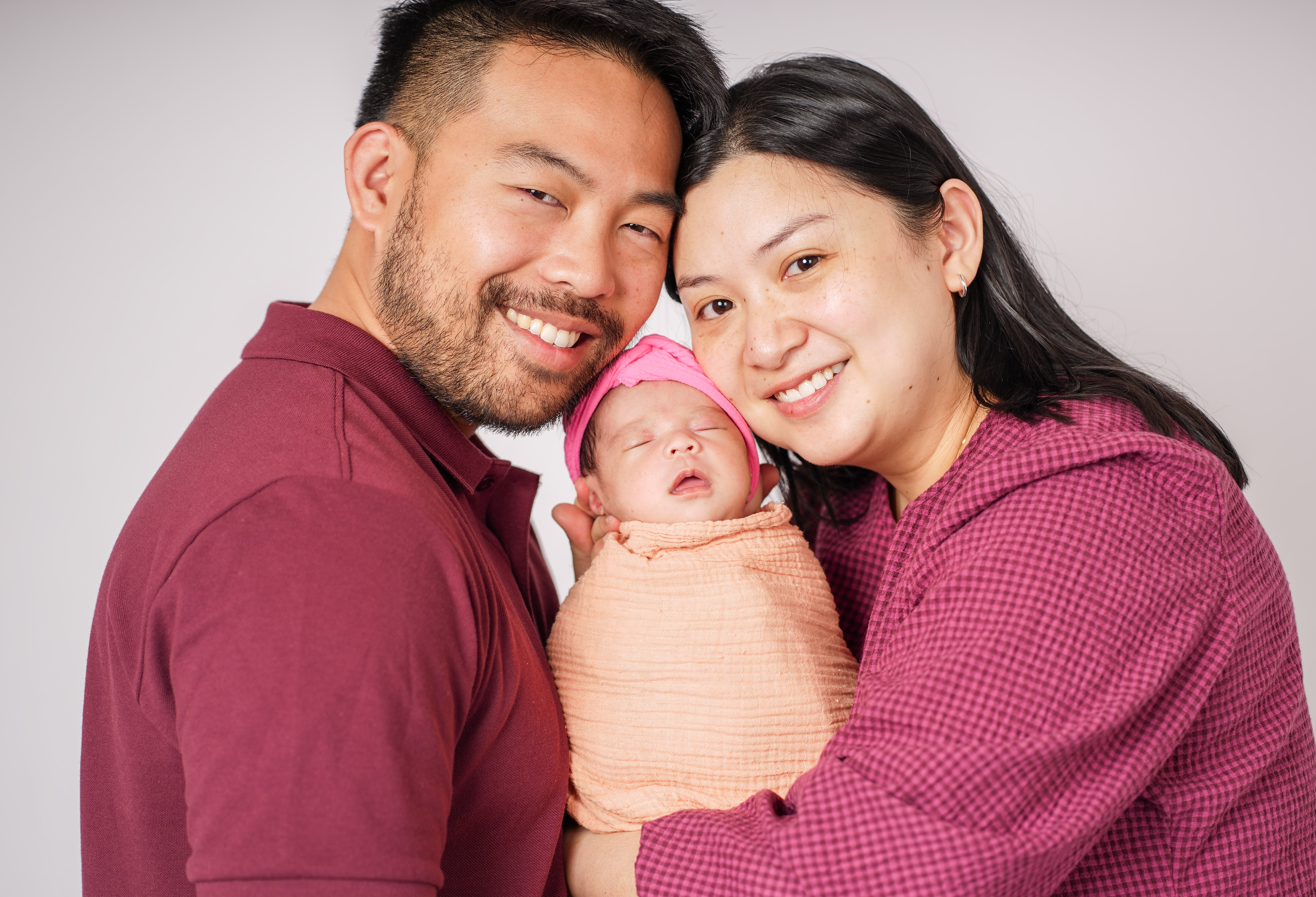 A family photographed in the Auckland studio