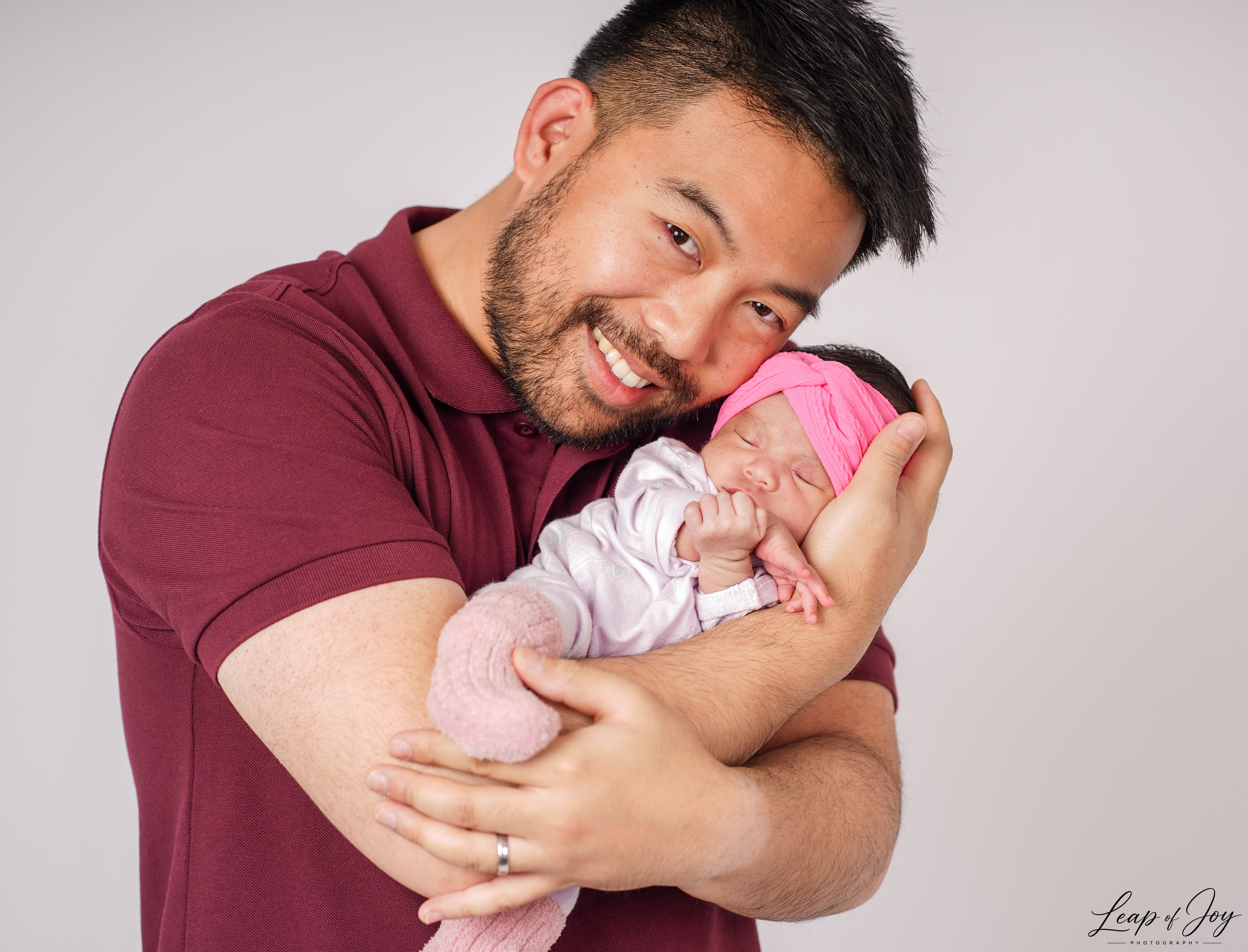 A family photographed in the Auckland studio