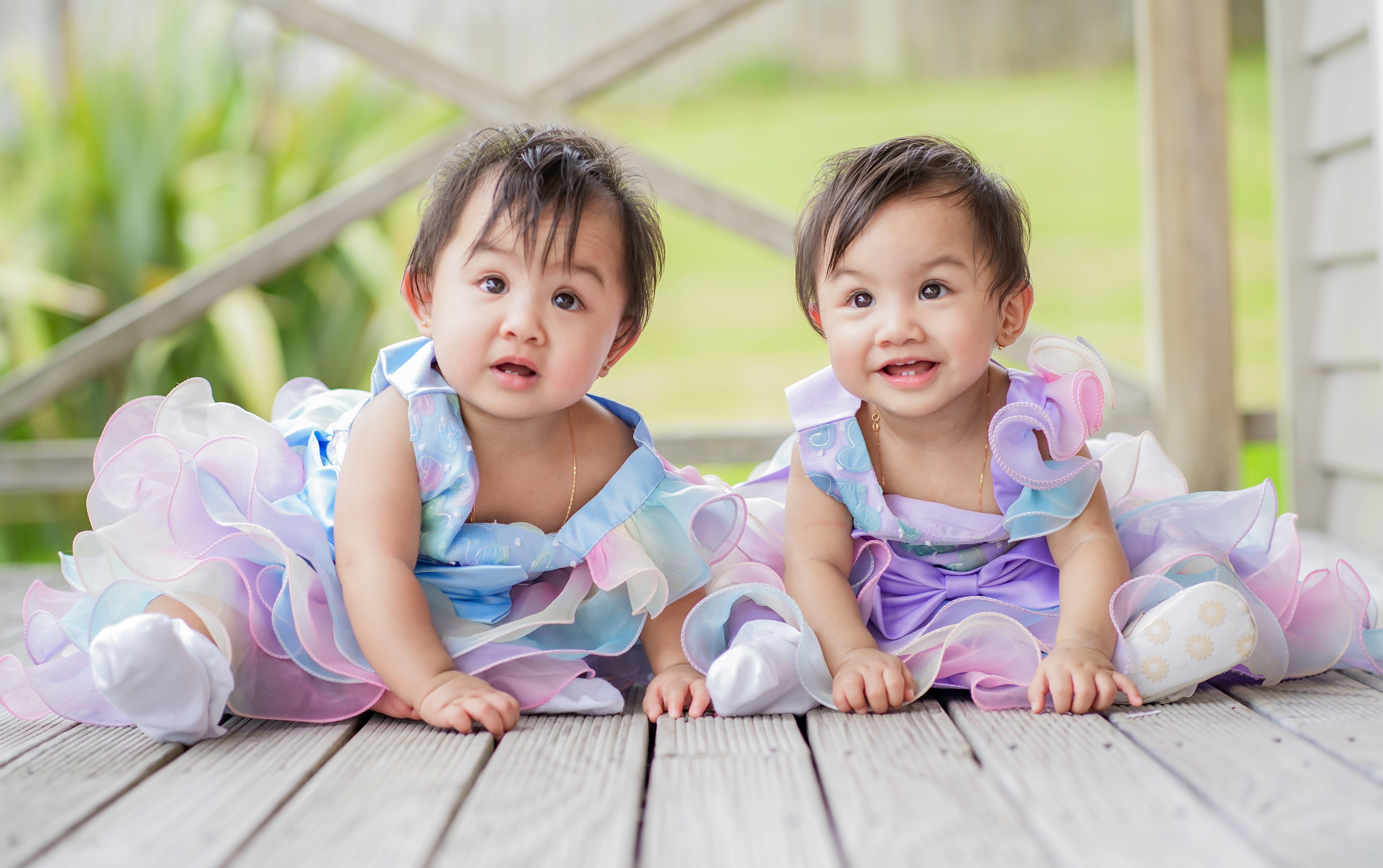 A family photographed outdoors in Auckland