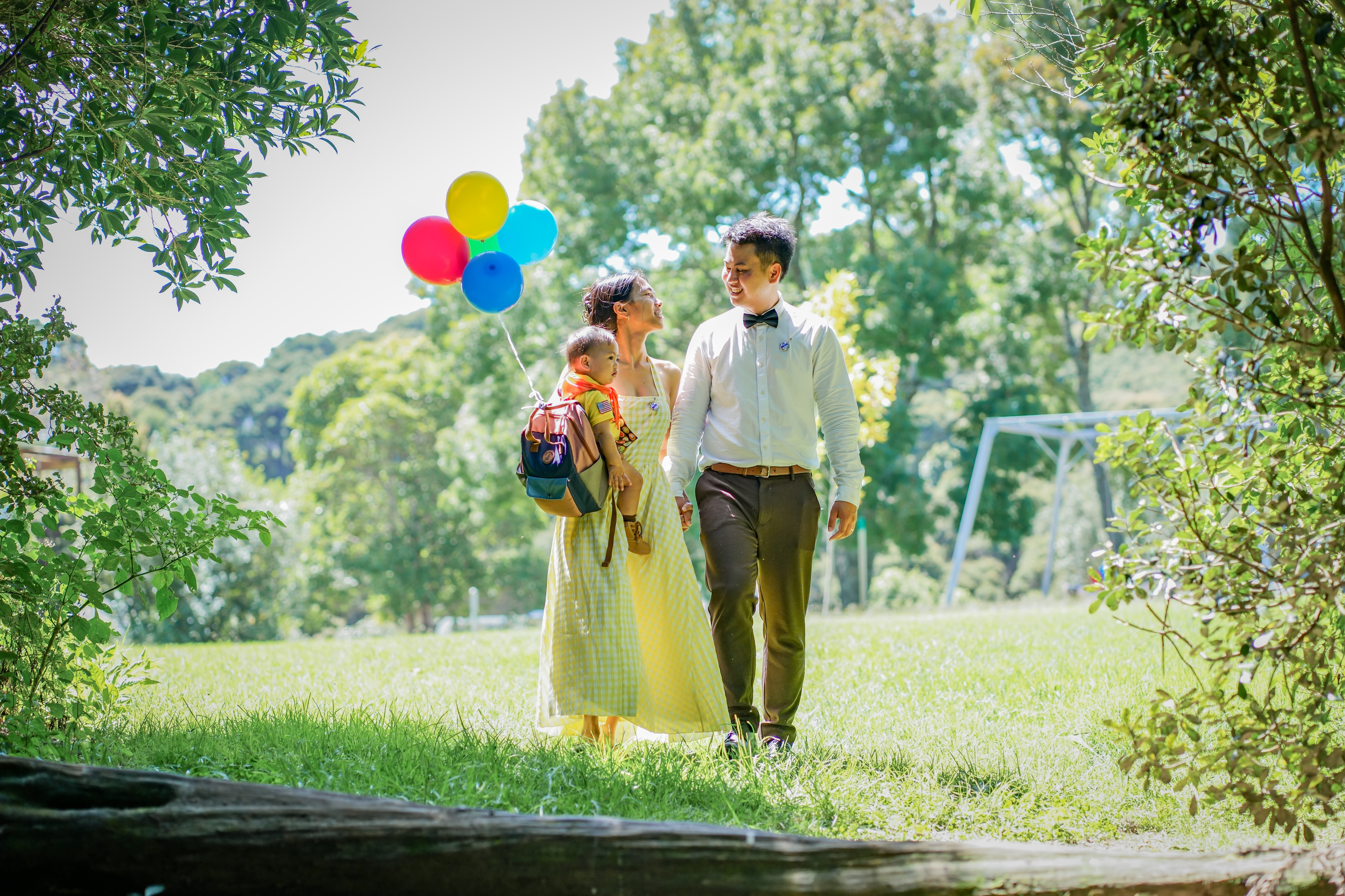 A family photographed outdoors in Auckland