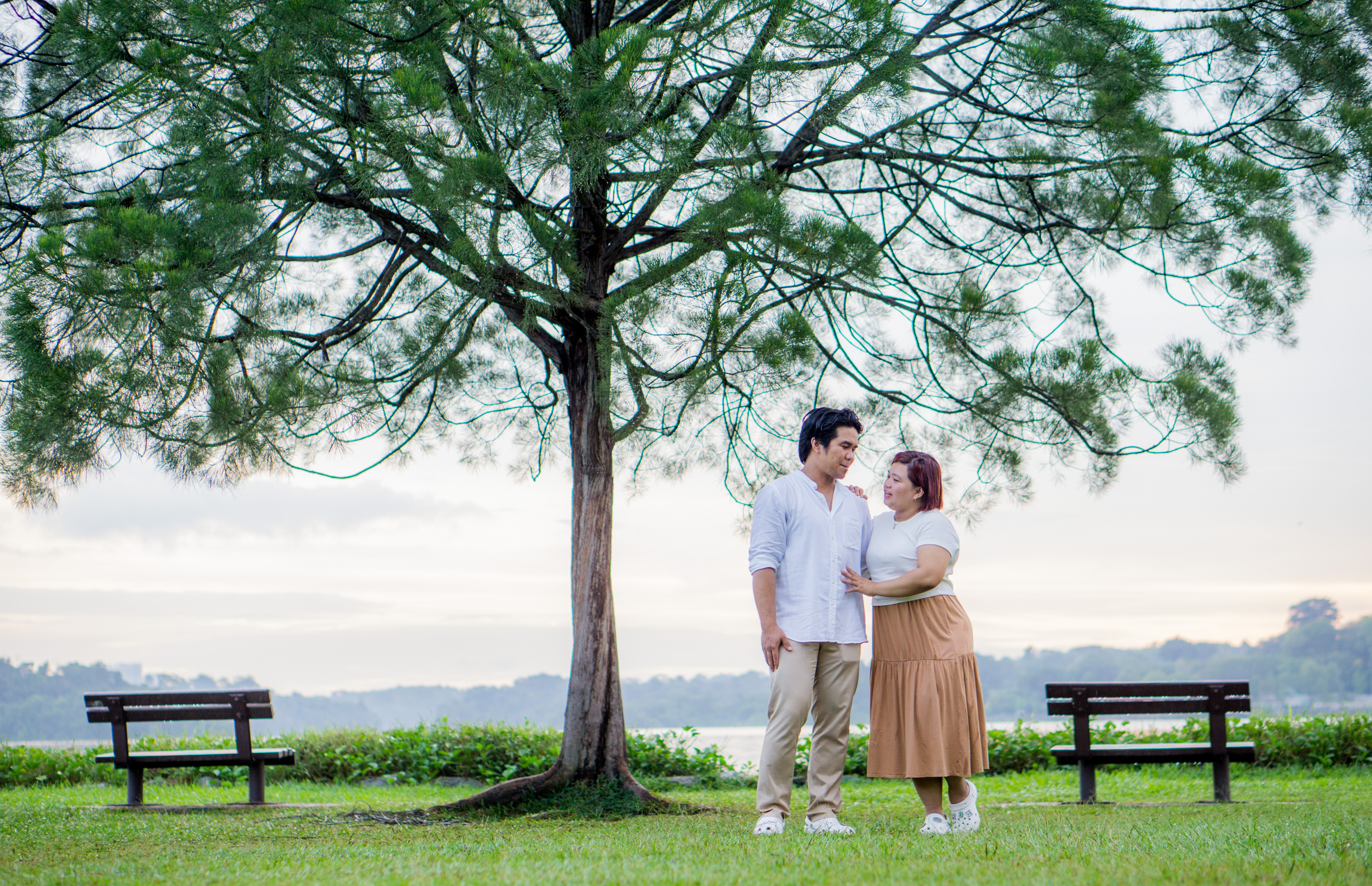 A family photographed outdoors in Auckland