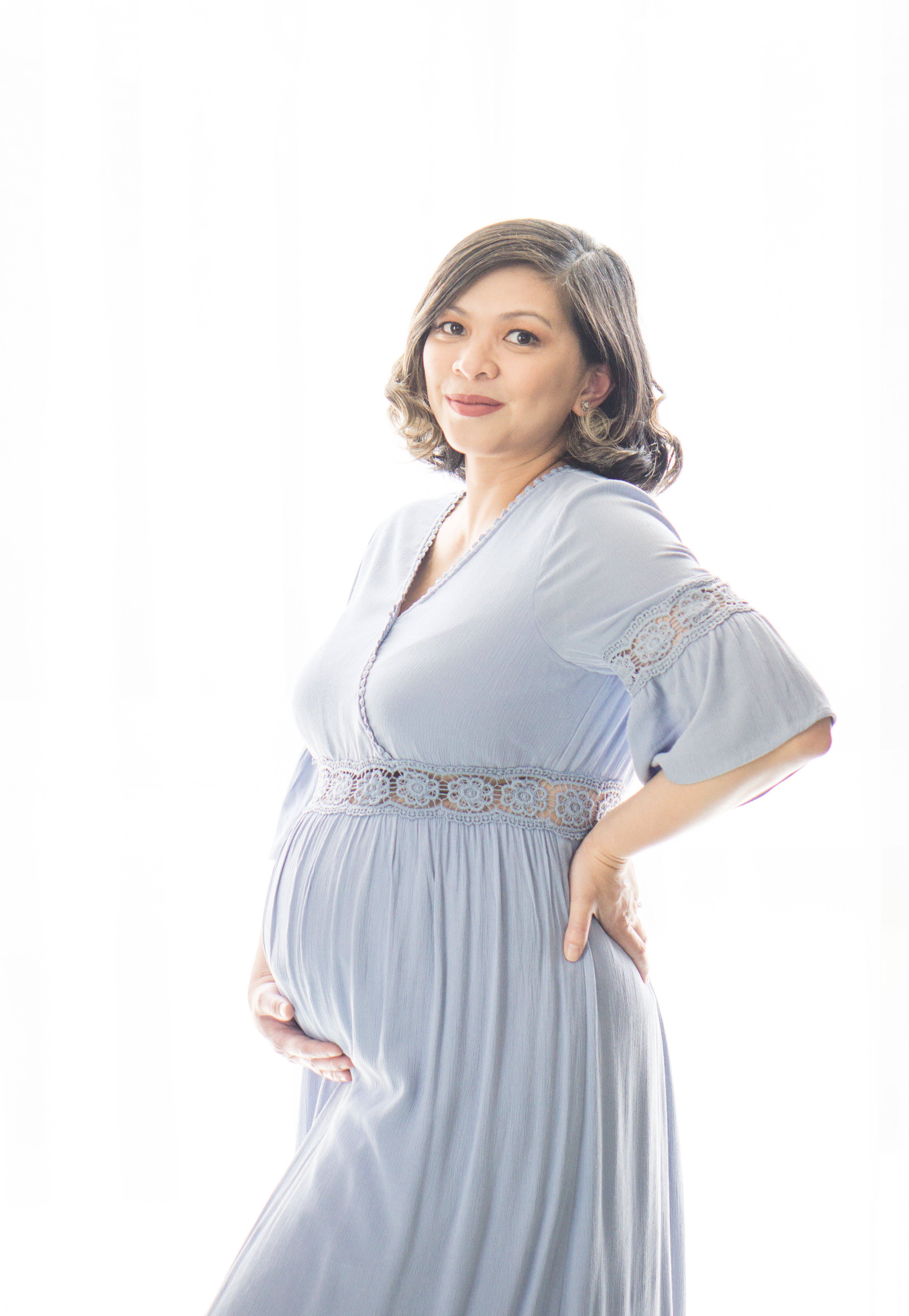 An expectant mother photographed in the studio