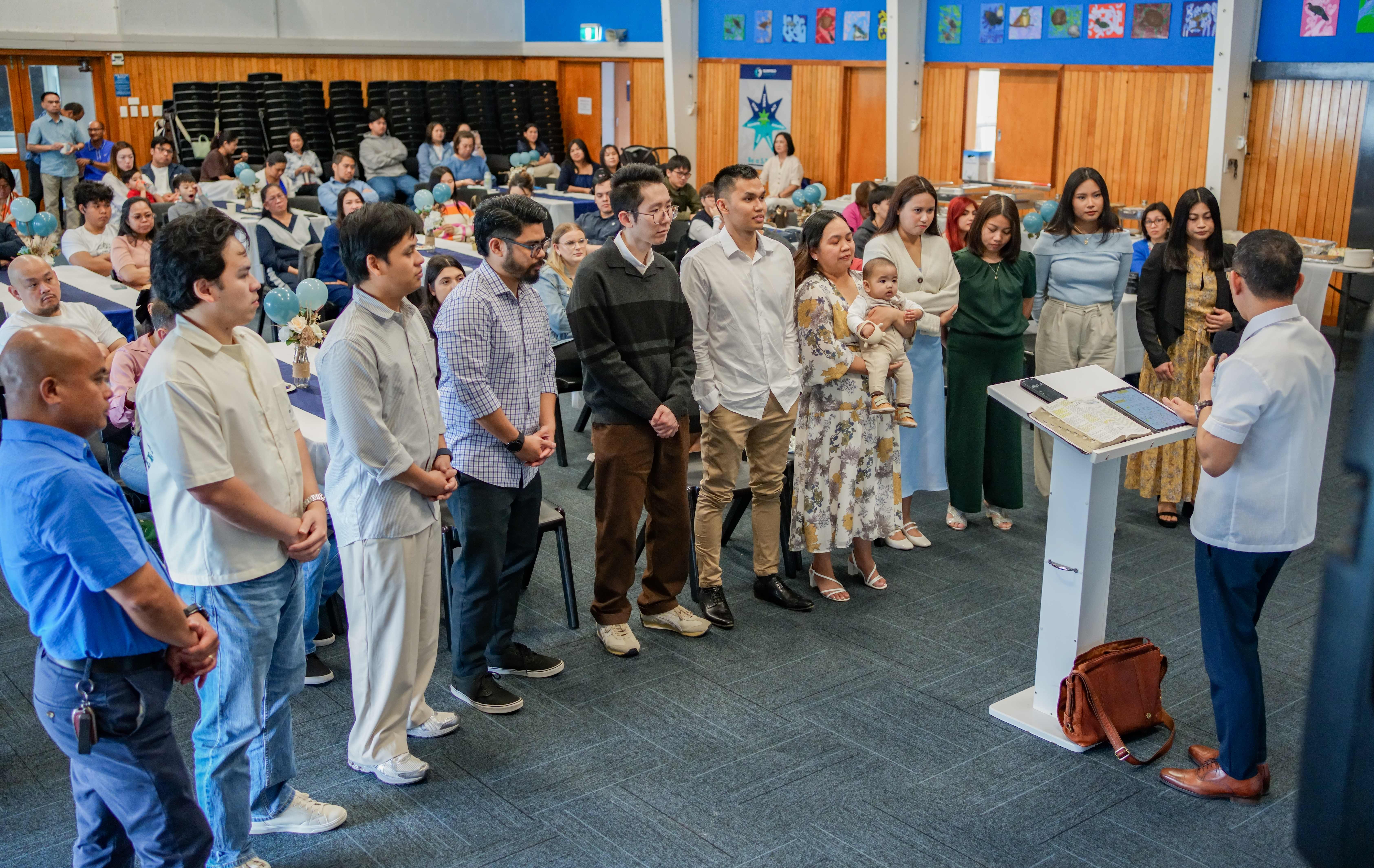 A congregation gathered for a baptism