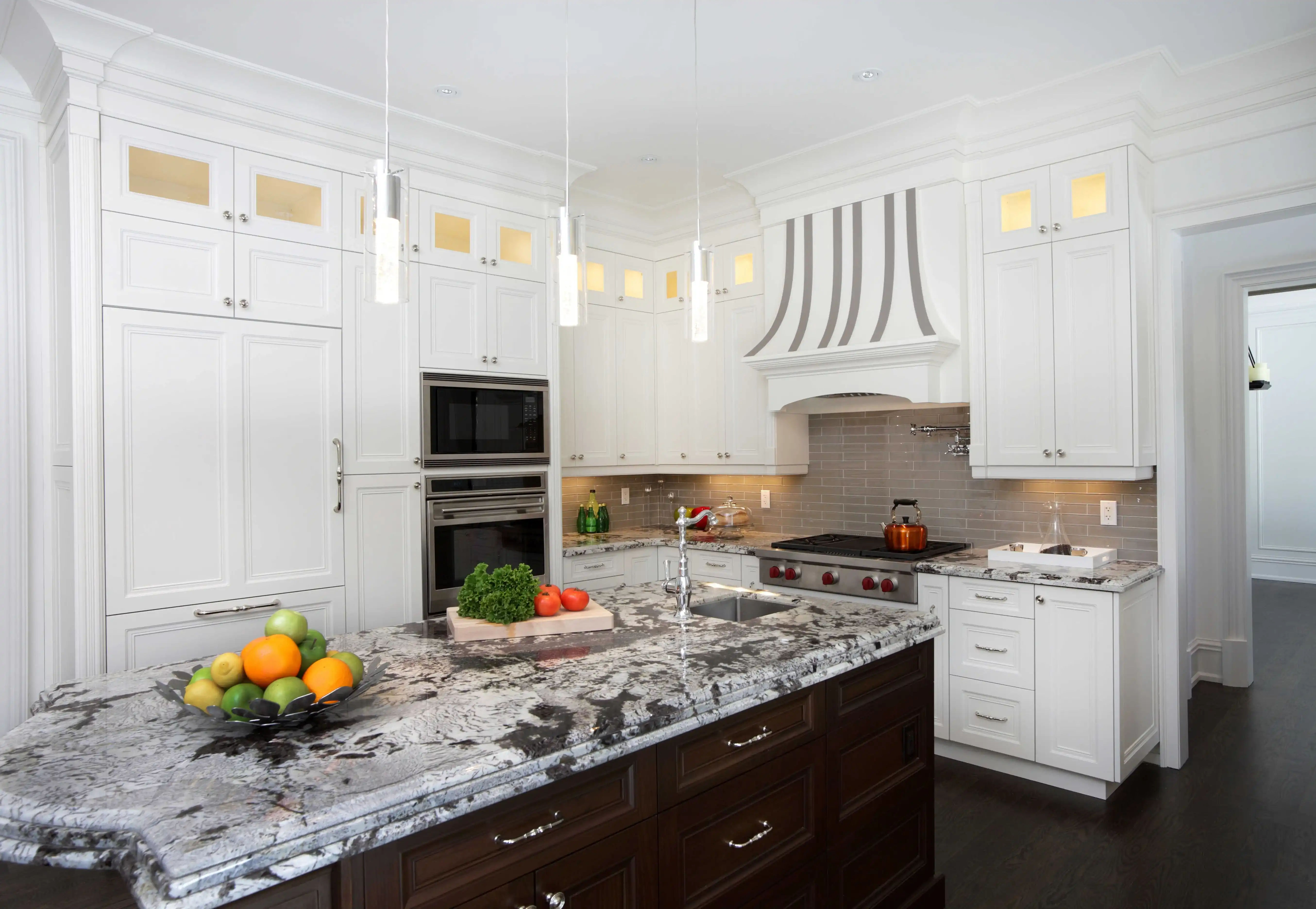 Premium kitchen remodel with bright cabinetry, wide island, and clean luxury finish