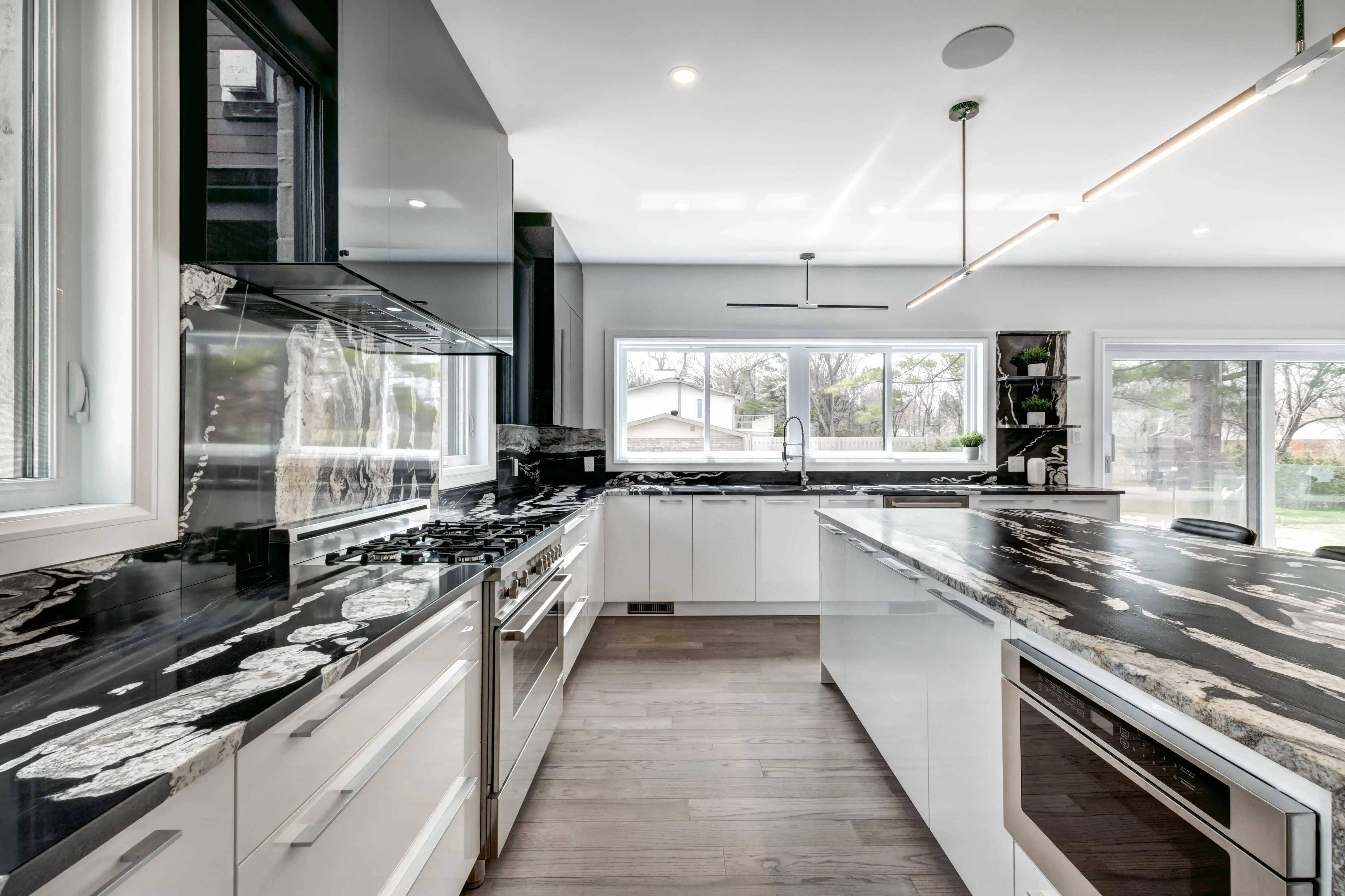 Finished kitchen remodel with functional layout, open prep space, and premium built-in elements