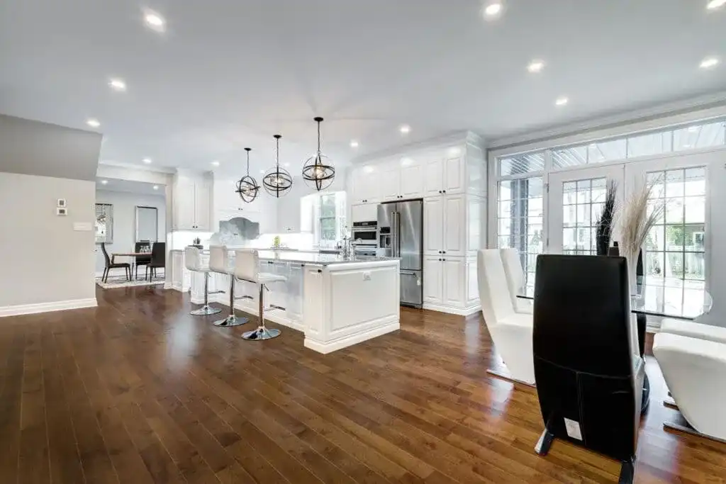 Completed kitchen remodel by B&Y Reno Corp — custom cabinetry, stone counters, open layout