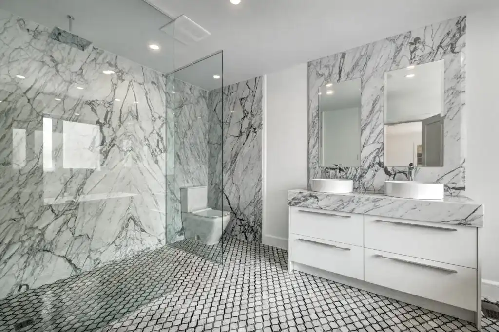 Luxury bathroom renovation by B&Y Reno Corp — clean spa-like finishes, refined tilework, and a calm high-end result
