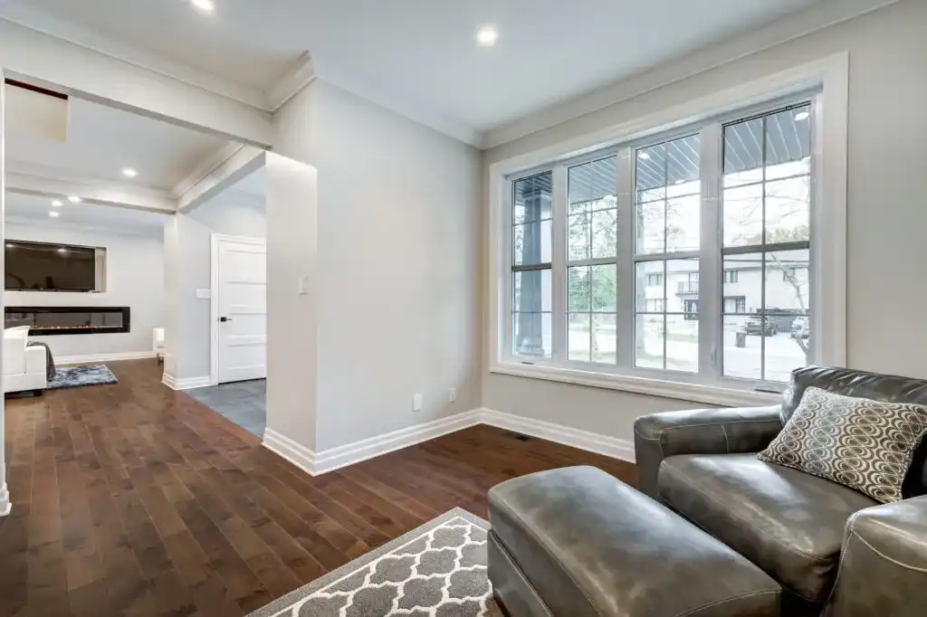 B&Y Reno Corp structural home renovation — open layout with refined finishes, beam installation, and cohesive interior execution