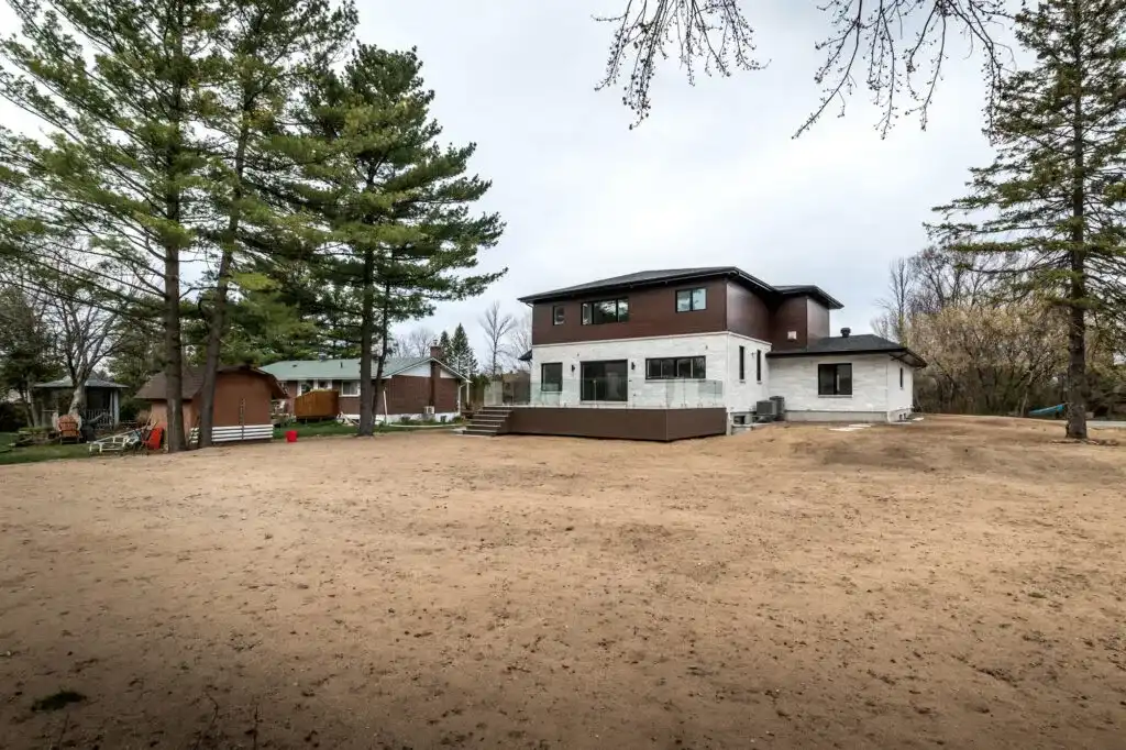 Custom home exterior with driveway and front walkway