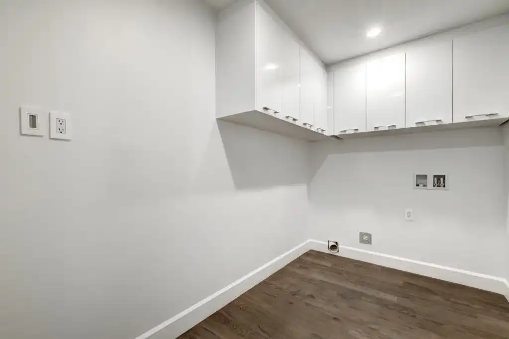 Modern black-and-white condo kitchen with premium finishes