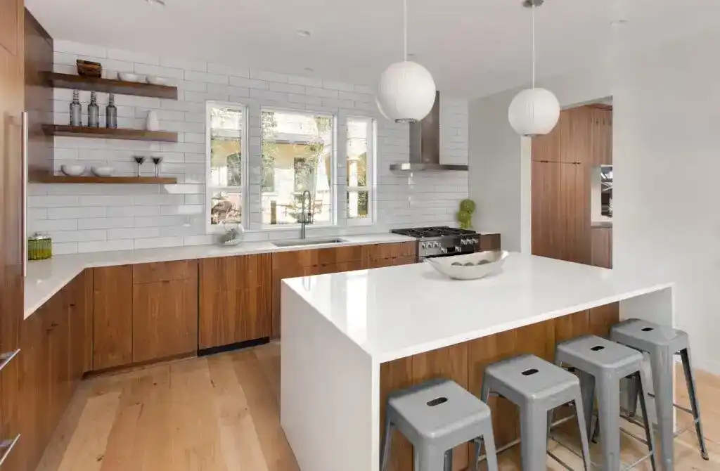 Custom walnut cabinetry with open shelving and bright finishes