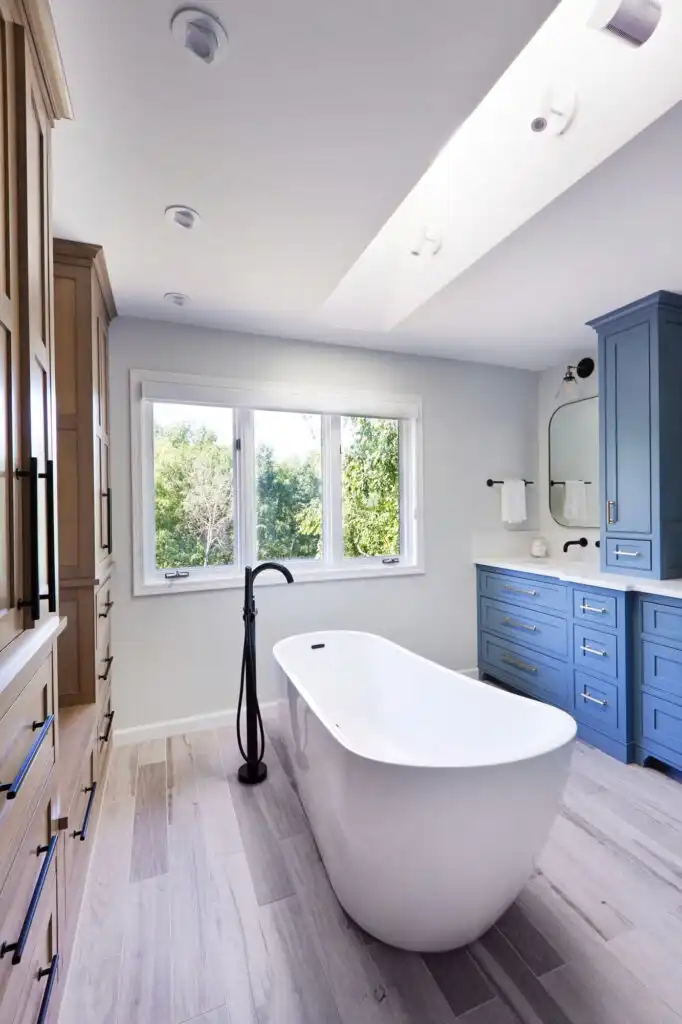Custom wood cabinetry and vanity detail in spa-style bathroom