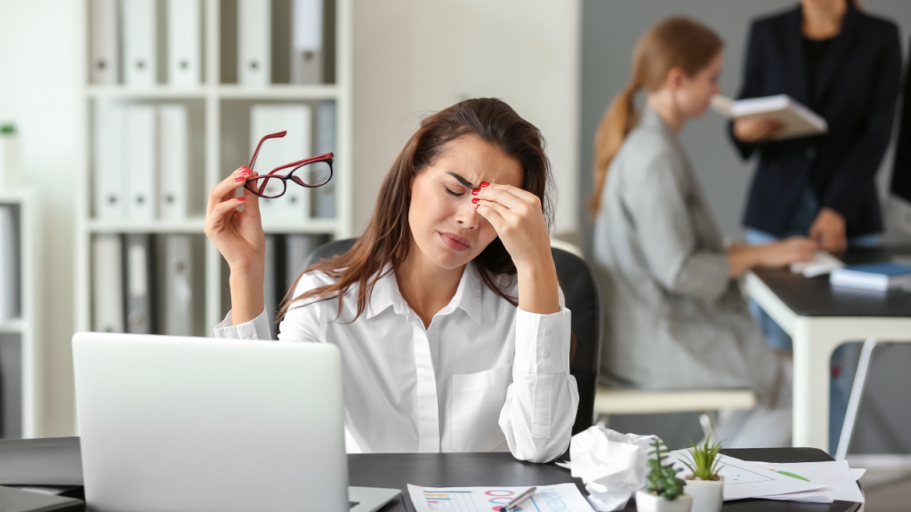Executive under pressure at her desk