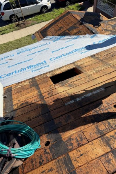 Roof decking repairs and preparation before installing new shingles in City Heights.