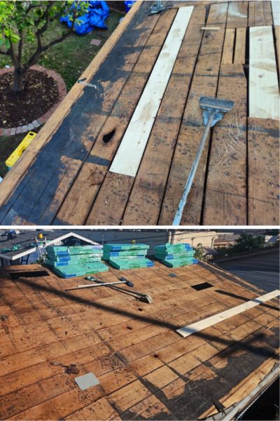Roof tear-off in progress on a City Heights home exposing the original wood decking.