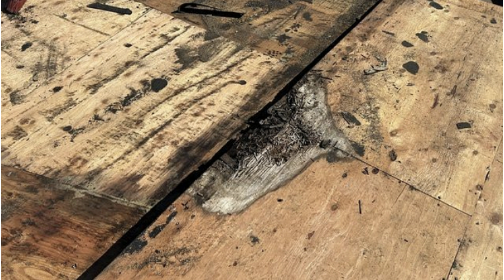 Rotted roof decking exposed during flat roof replacement Ocean Beach San Diego