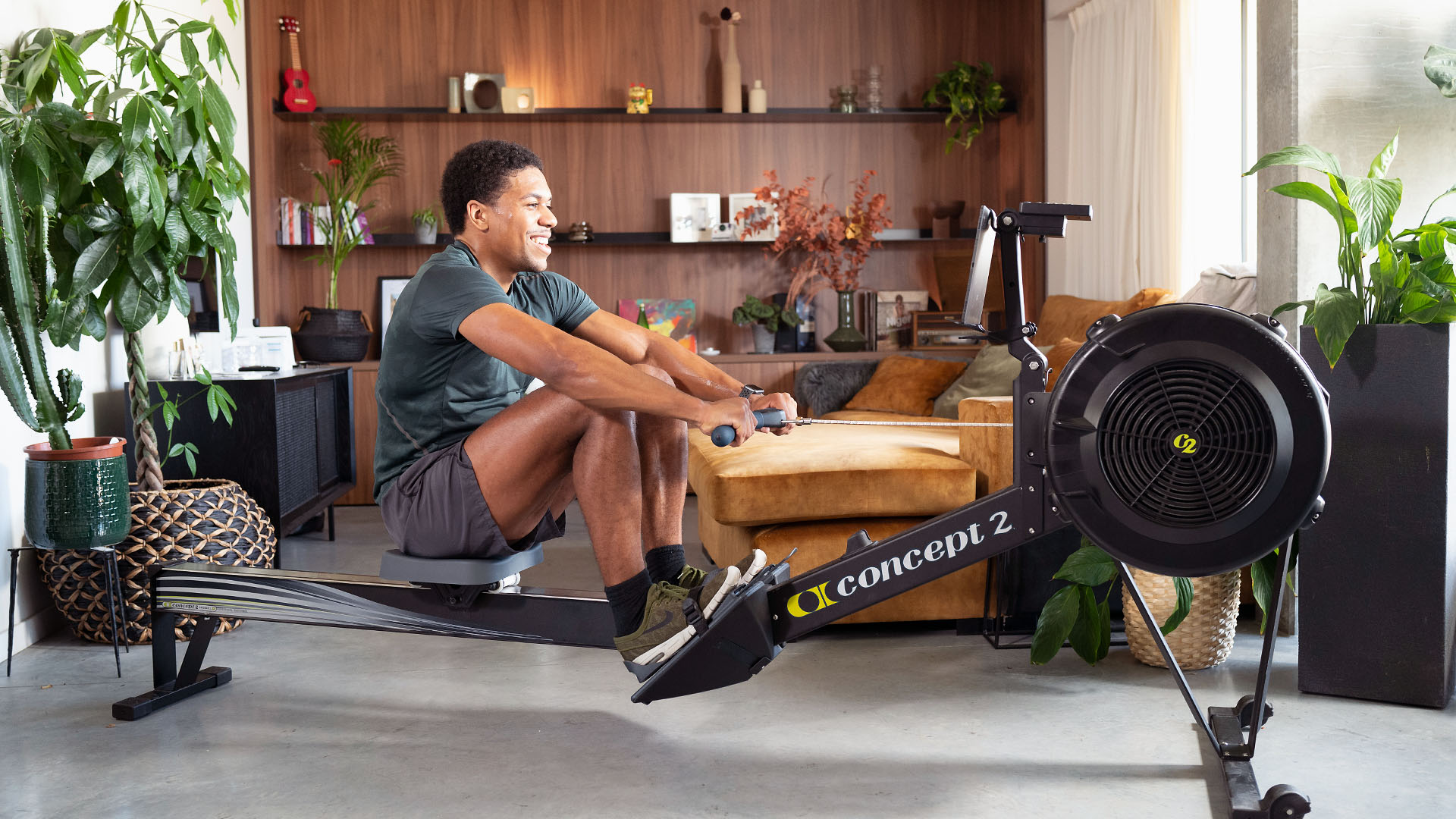 A rowing machine in a beautifully decorated home living room. A rowing machine in a beautifully decorated home living room.