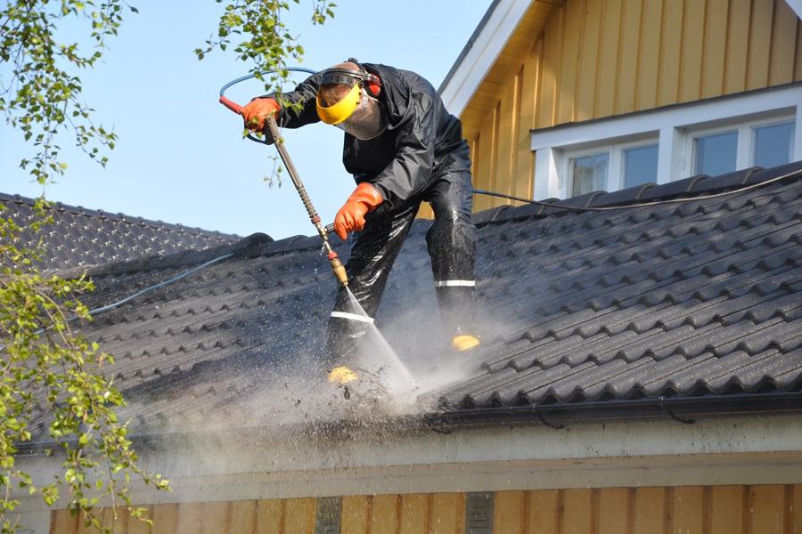 Clean gutters and downspouts on a home, gutter cleaning, Dallas Texas