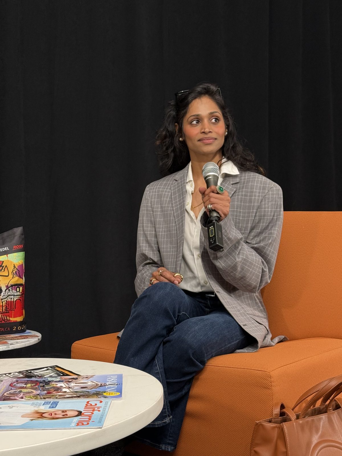 Tejaswi Mulagada speaking at a conference