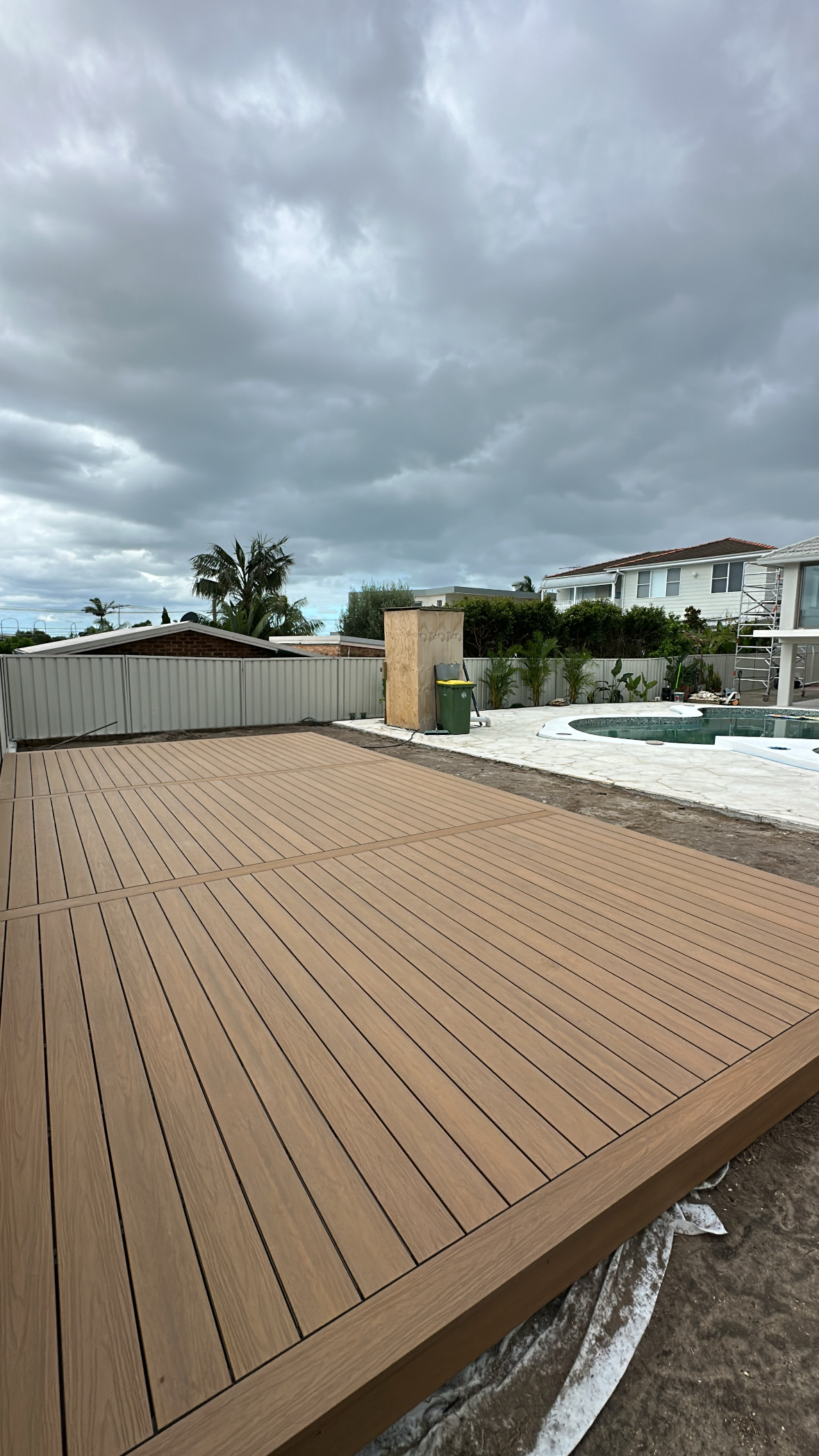 Composite deck finished beside a pool