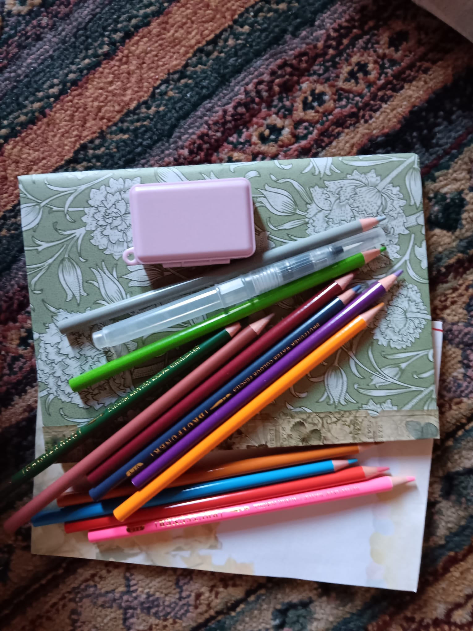 coloured pencils and art journal for Christian doodling prayer practice