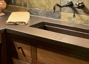 bathroom with metal countertops