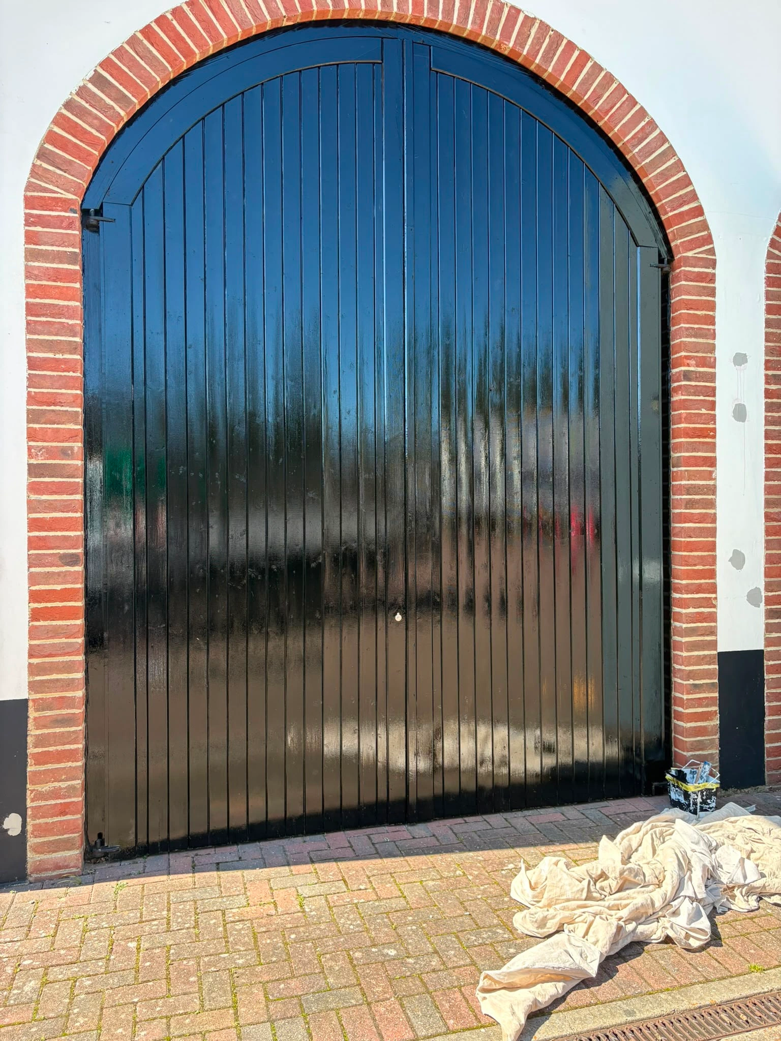 Restored and gloss-painted coach house gates