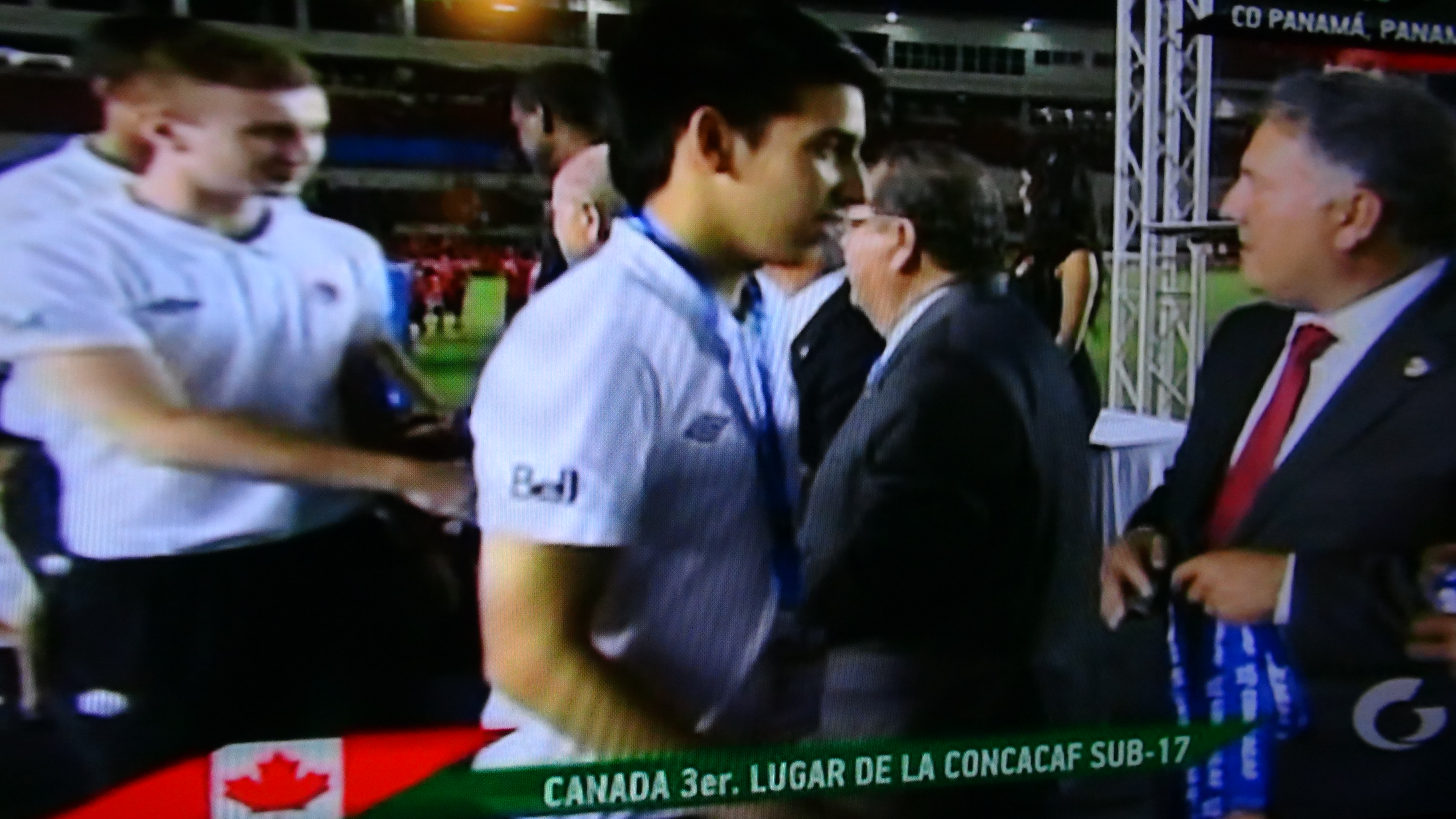 Derick receiving third place medal for Concacaf World Cup qualifiers