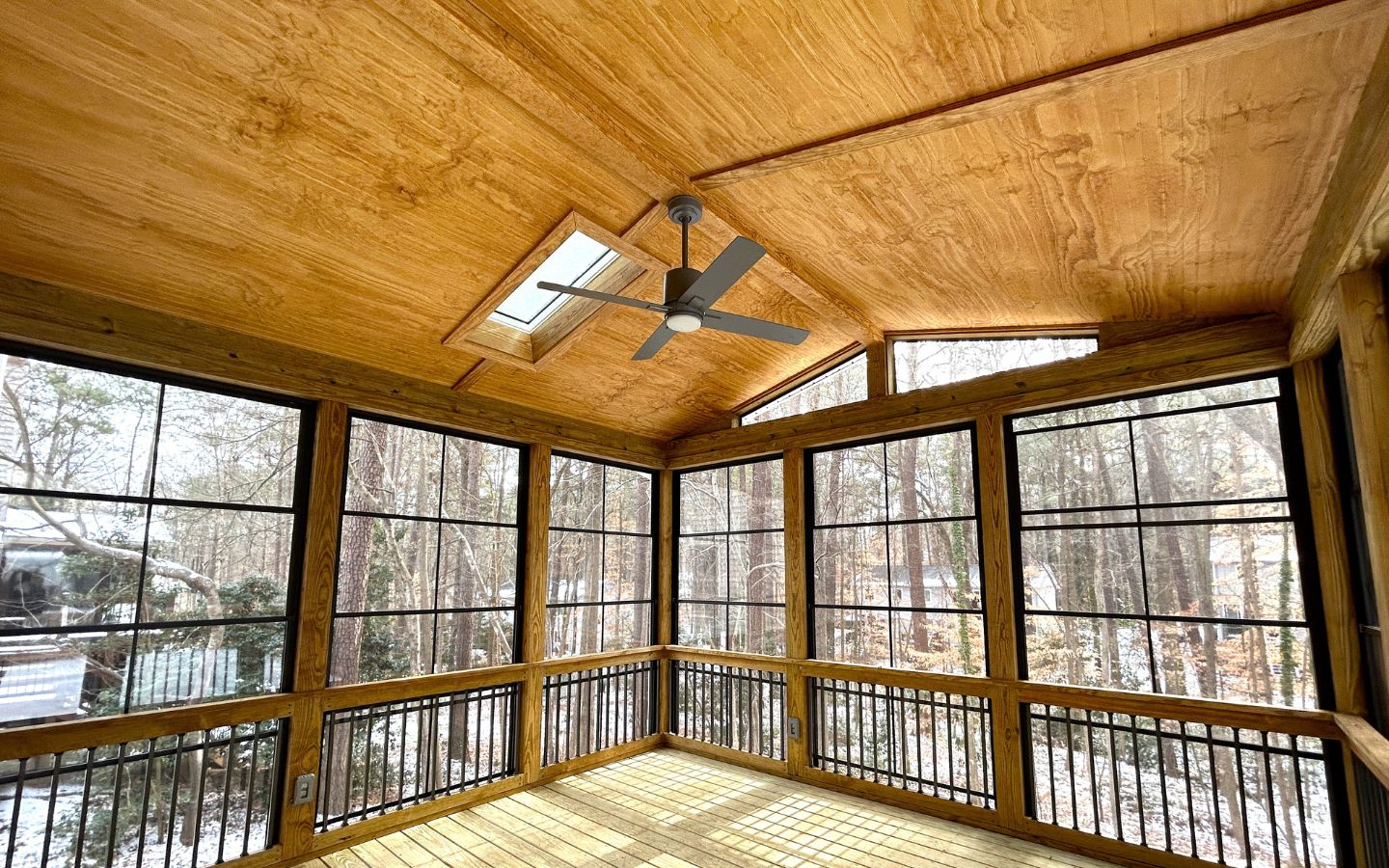 Finished screened three season porch attached to a Wisconsin home