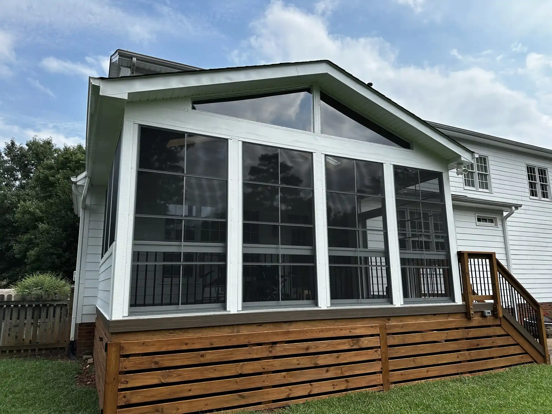 Porch framing and roof structure in progress before finish work
