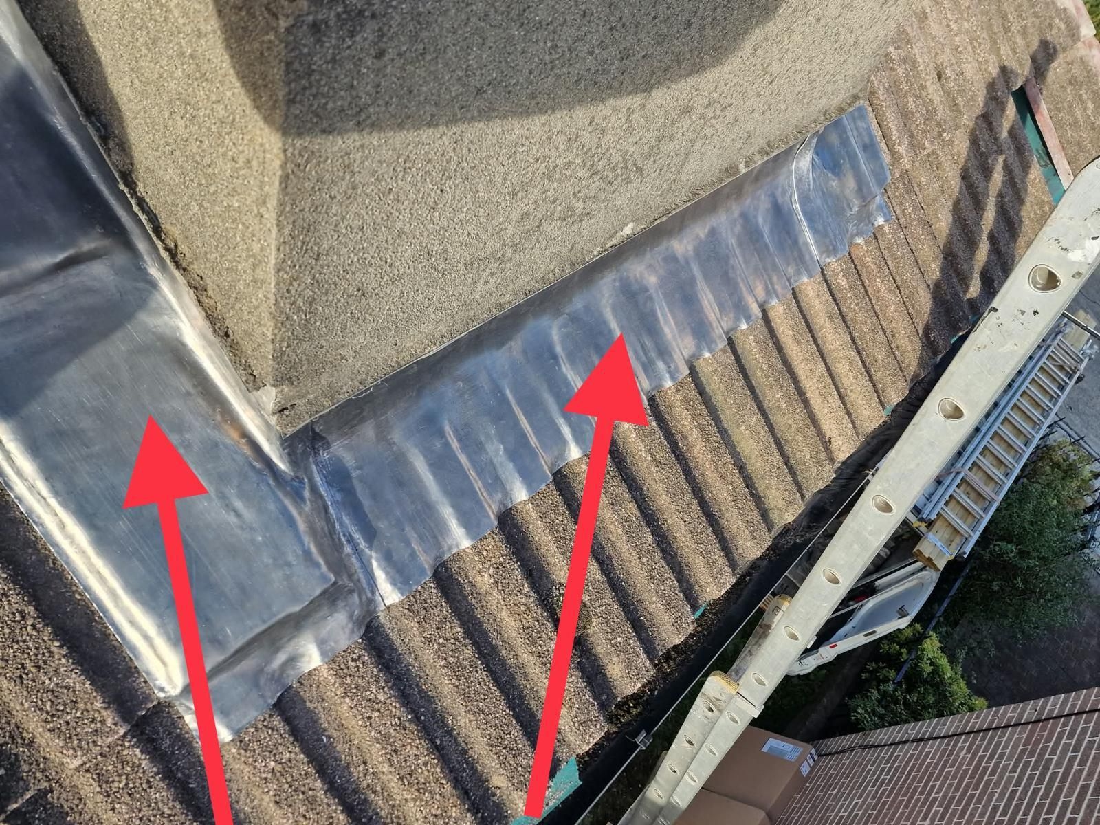 New lead apron and side flashing around a rendered chimney on a Ballsbridge, Dublin 4 roof