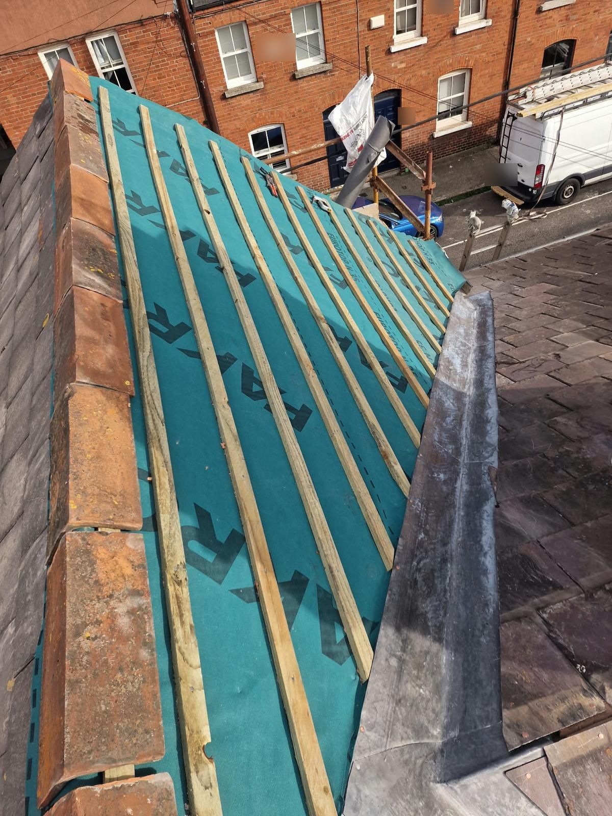 Re-felted roof slope with new battens running down to a new lead valley in Portobello, Dublin 8