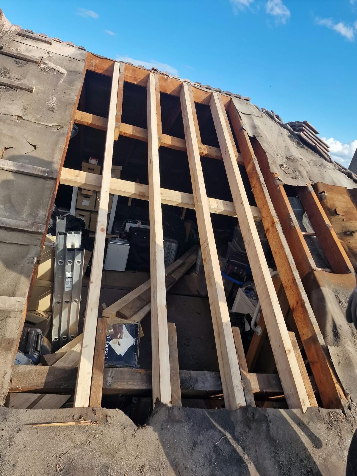 Roof opened up to the rafters, with new timbers fitted among the existing ones, in Ballsbridge, Dublin 4