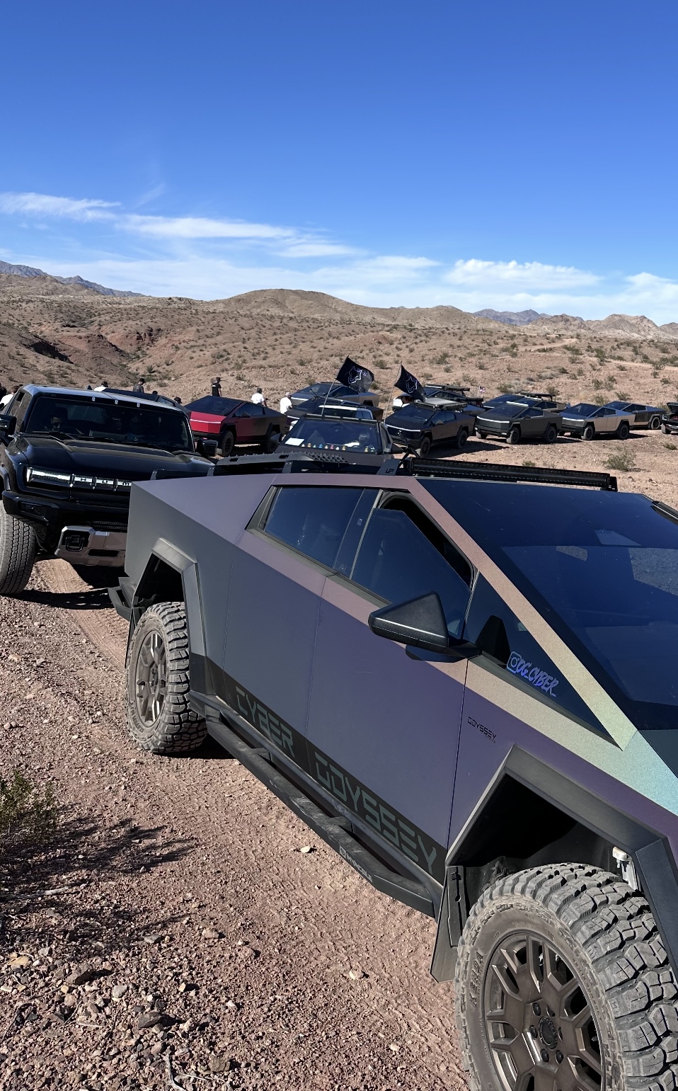 Cybertruck convoy on desert trail