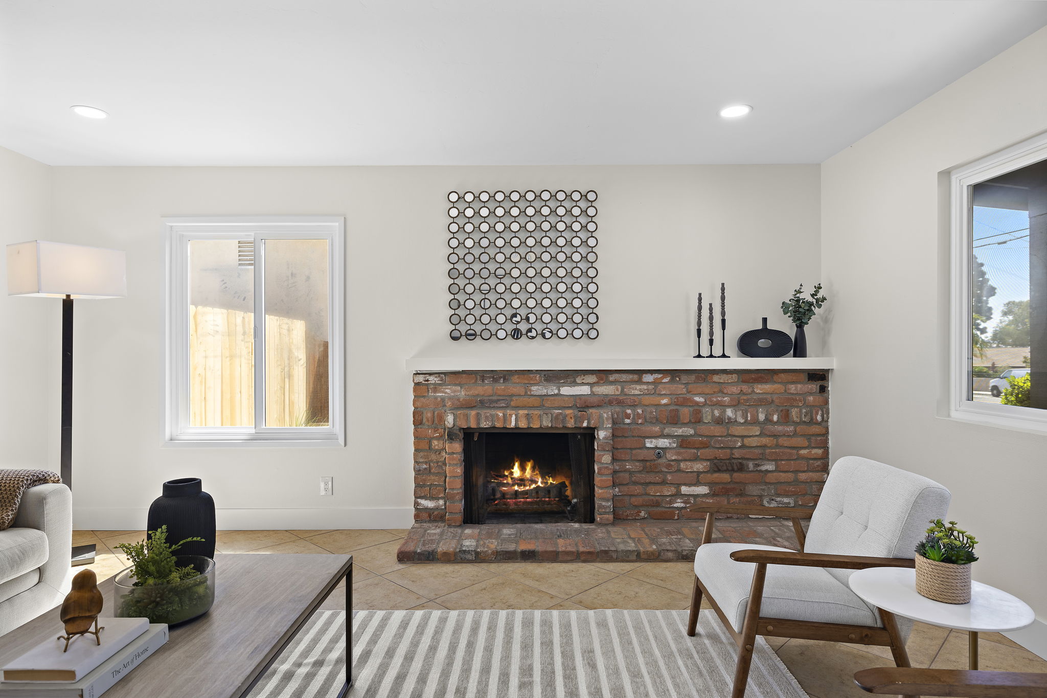 Living room with brick fireplace