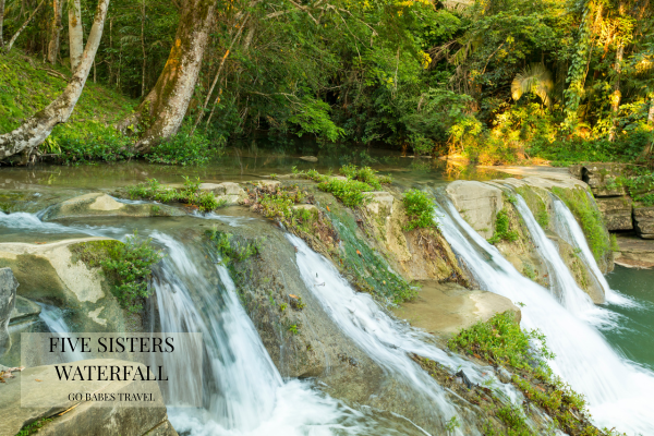 Five Sisters Waterfalls cascading through the forest at GAÏA Riverlodge in Belize