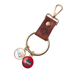 Leather charm holder with destination charm