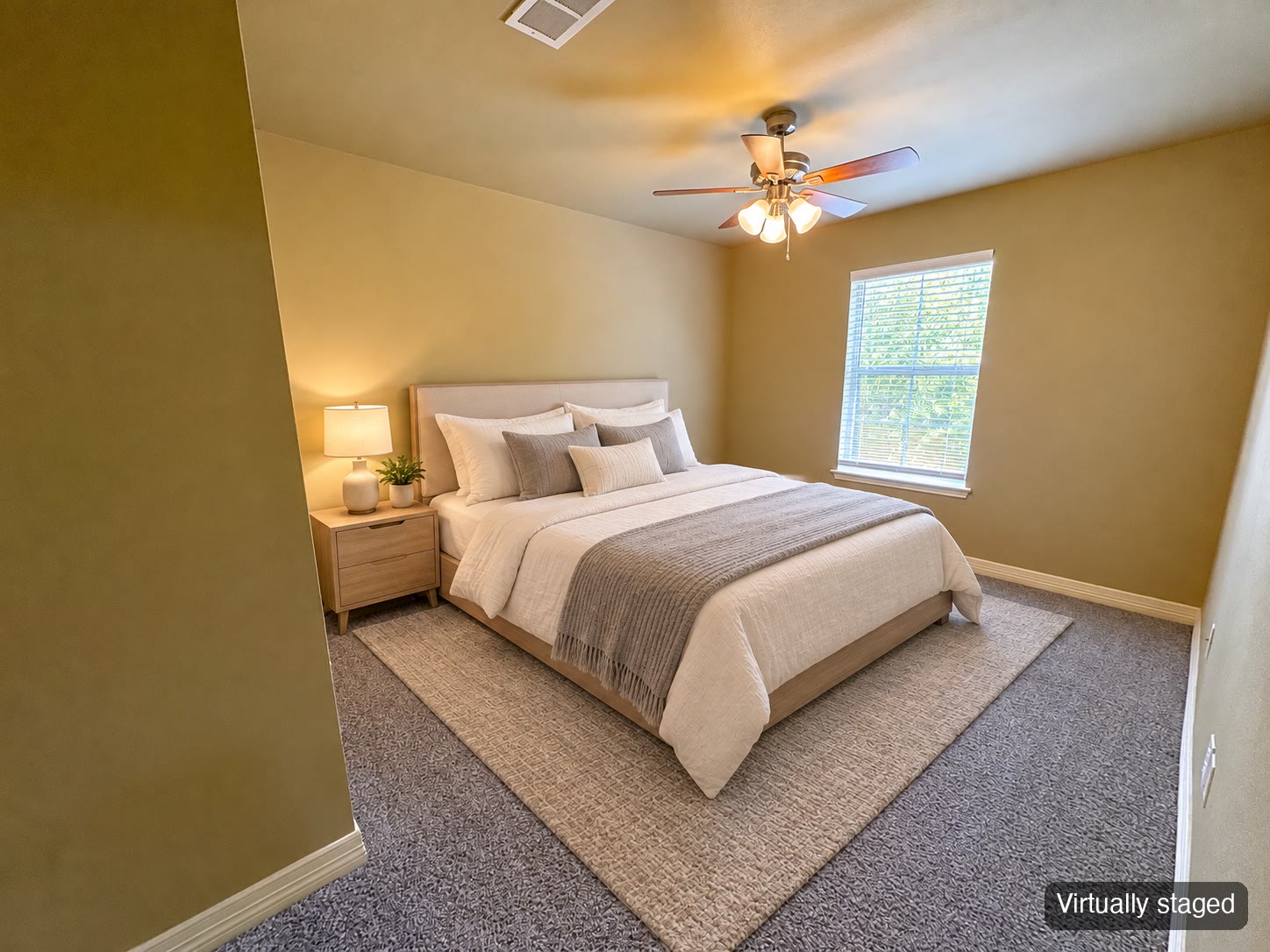 Bedroom with queen bed and nightstands (virtually staged)
