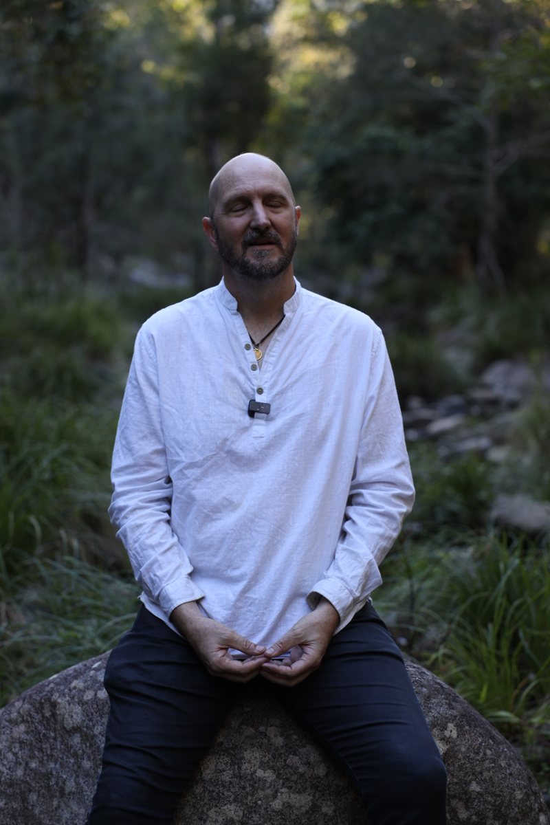 Chris meditating in the forest