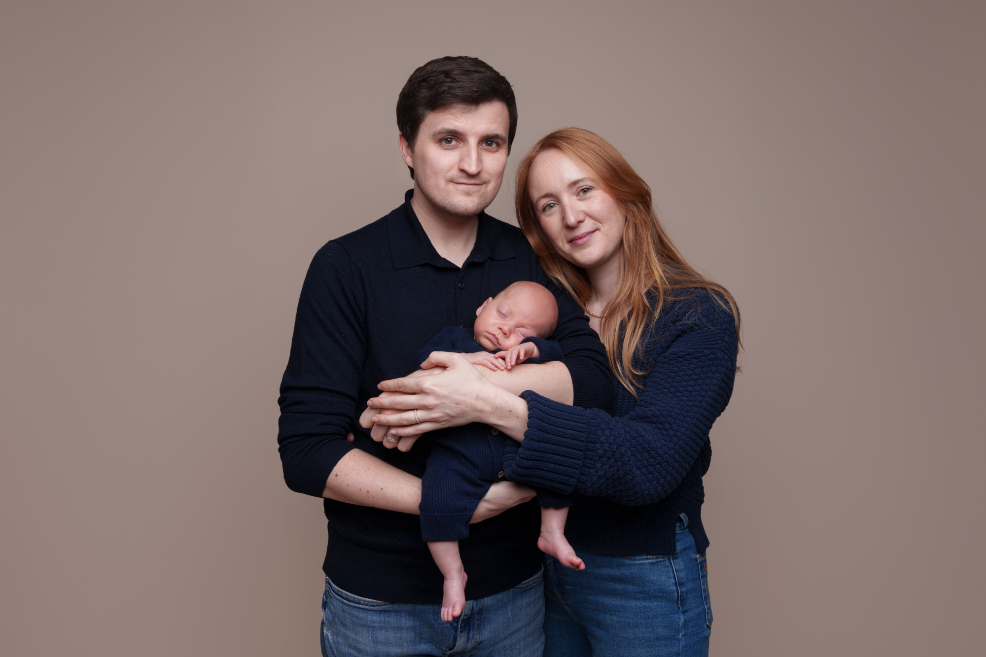 A family with their newborn baby