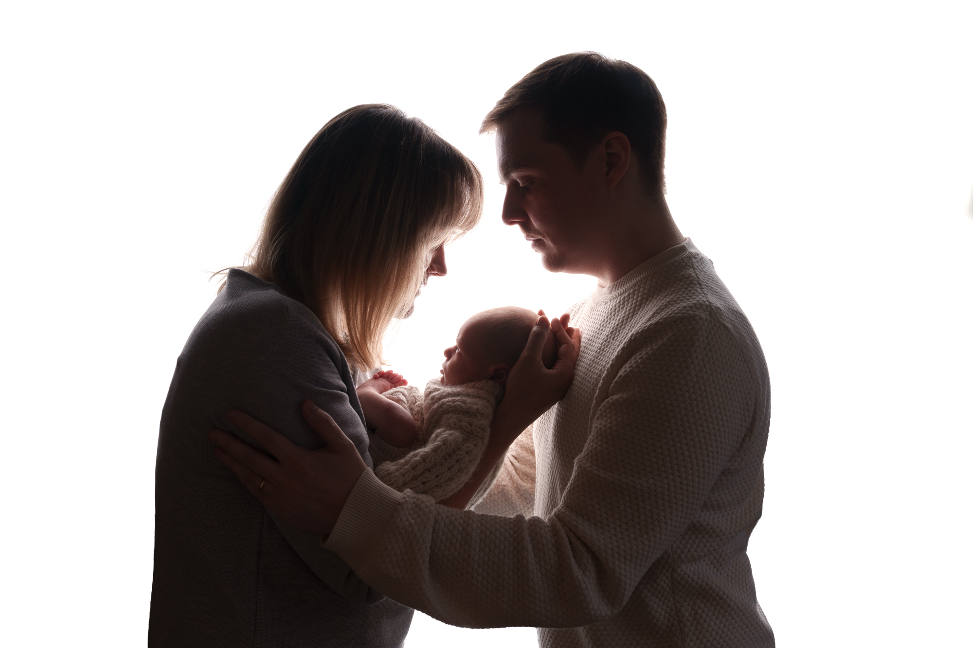 A family with their newborn baby