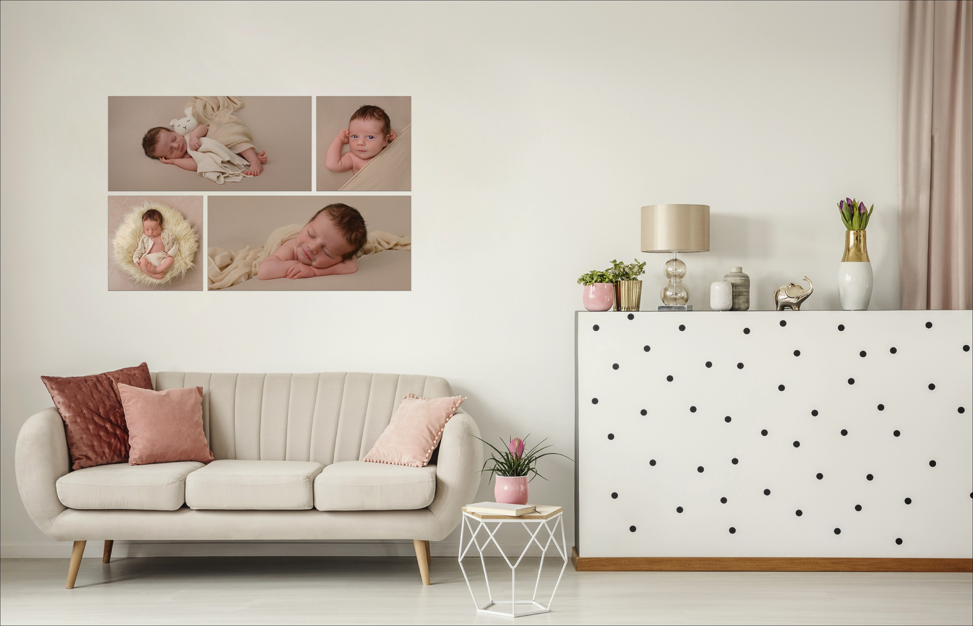Newborn portraits displayed as wall art in a living room