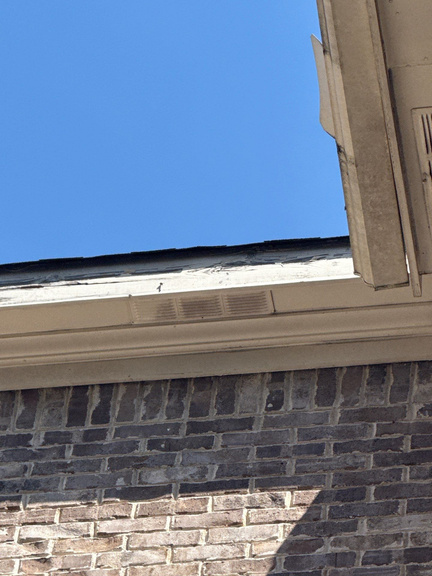 Finished fascia repair along a roofline