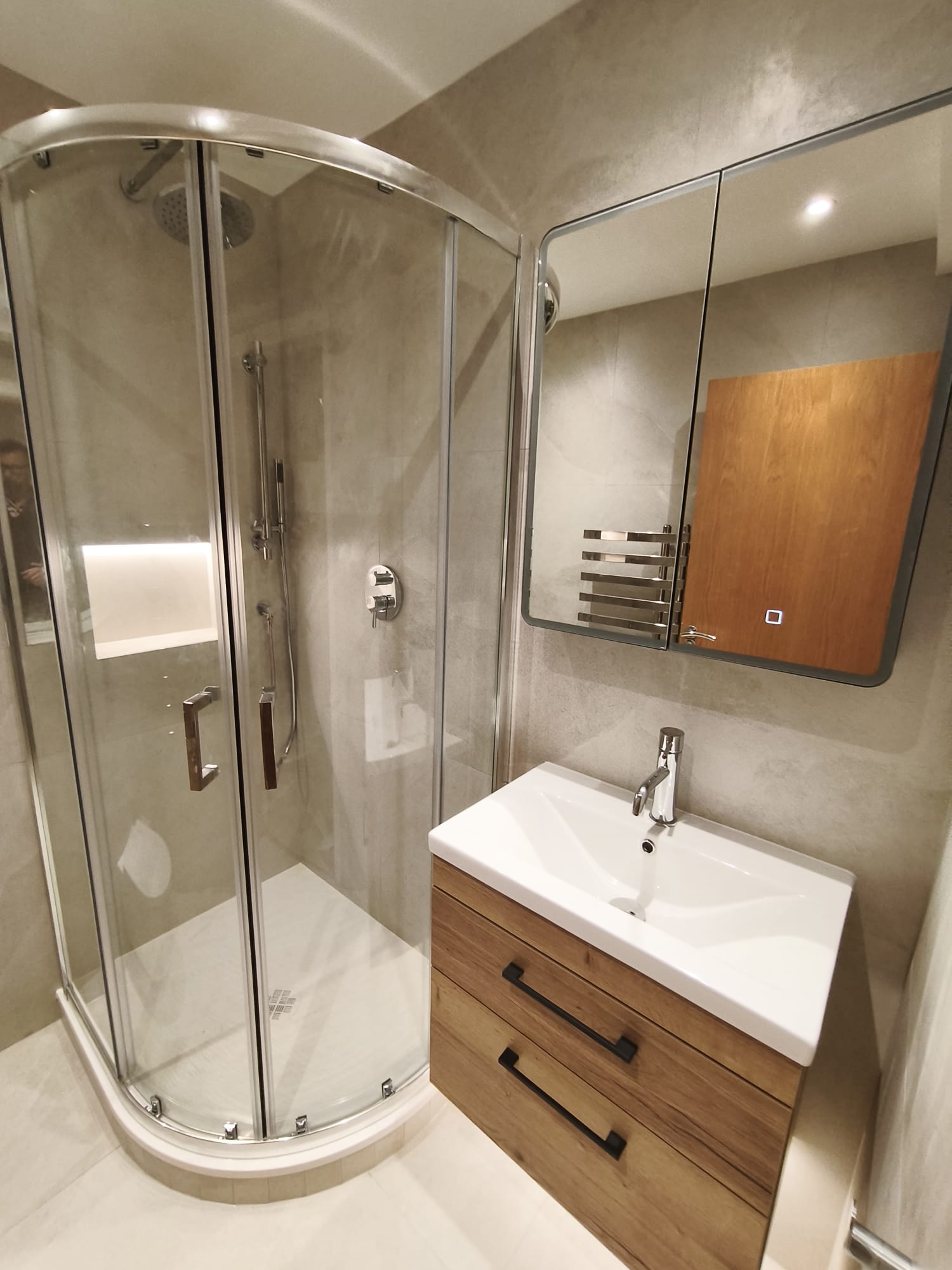 Small bathroom design ideas with a compact shower, vanity storage and calm neutral finishes that help the room feel bigger