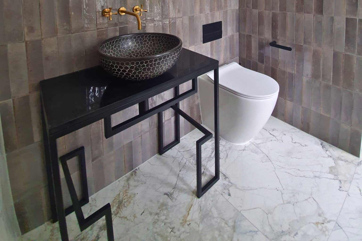 Porcelain floor tiles in a bathroom with a subtle textured finish